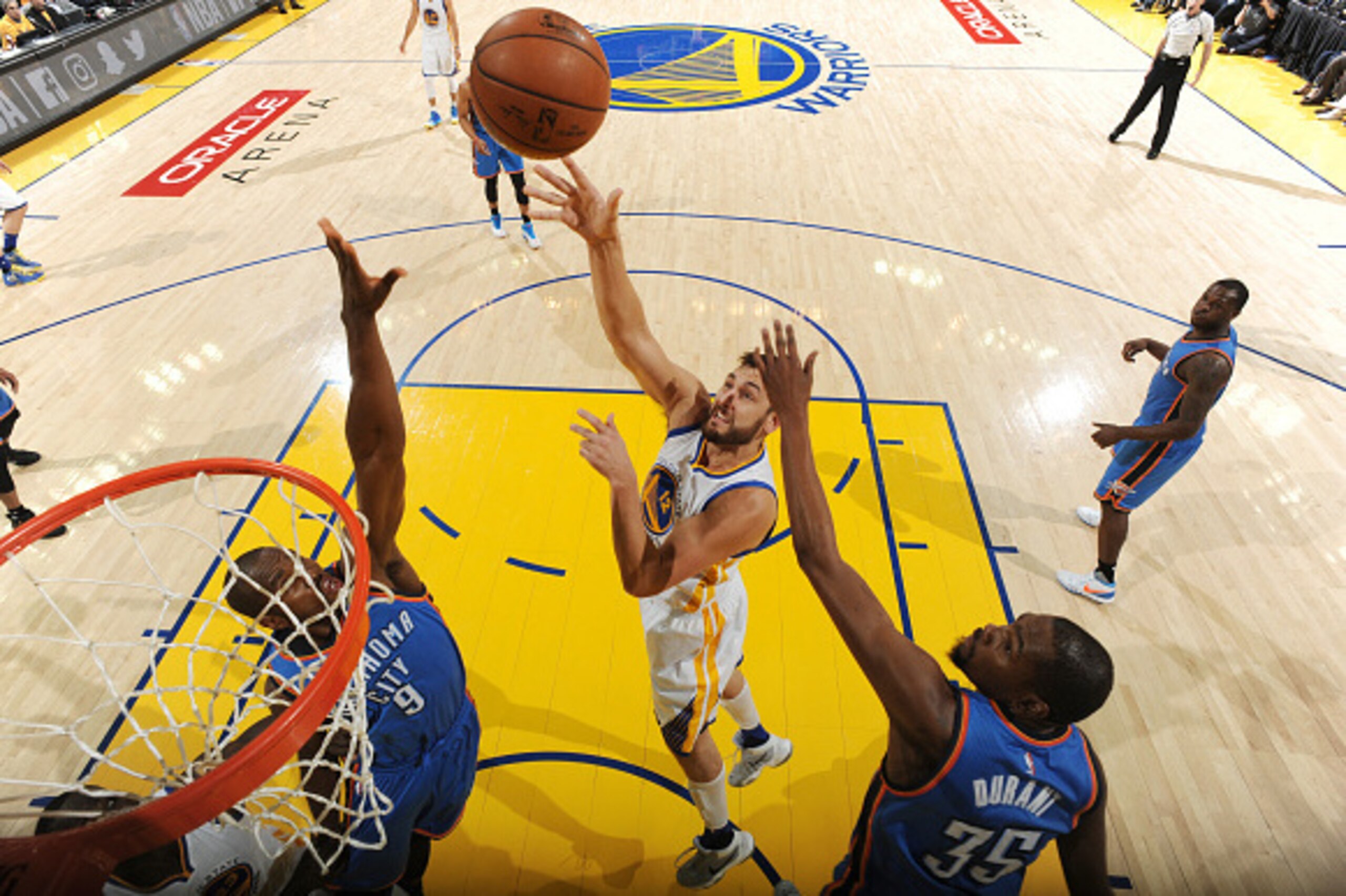 OAKLAND, CA - MAY 26:  Andrew Bogut #12 of the Golden State Warriors shoots the ball against the Oklahoma City Thunder in Game Five of the Western Conference Finals during the 2016 NBA Playoffs on May 26, 2016 at ORACLE Arena in Oakland, California. NOTE 