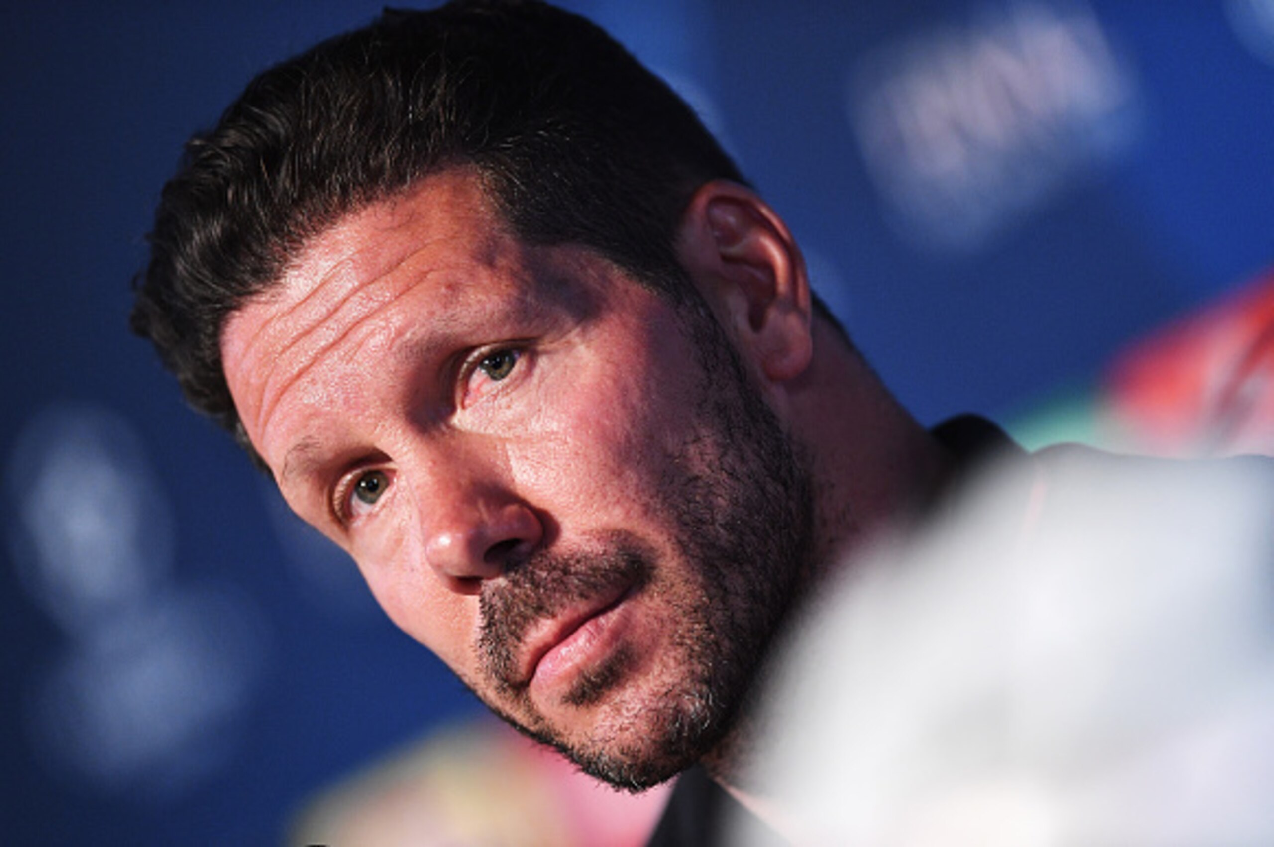 MILAN, ITALY - MAY 27:  In this handout image provided by UEFA Head coach Diego Simeone of Atletico Madrid talks to the media during a Atletico de Madrid press conference on the eve of the UEFA Champions League Final against Real Madrid at Stadio Giuseppe