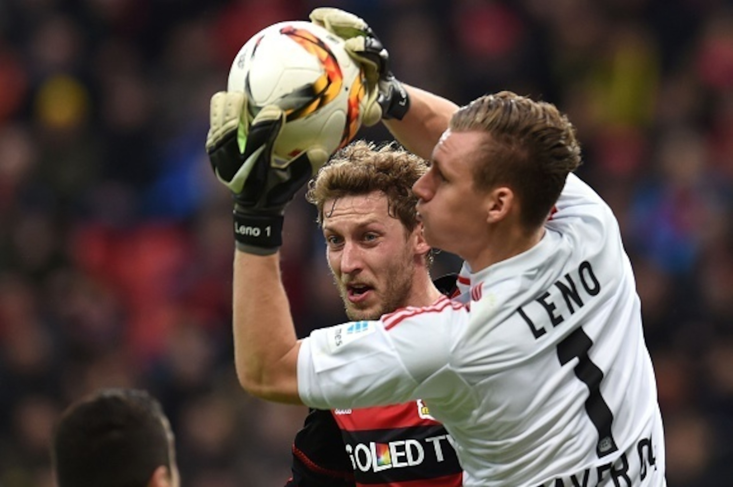 Leverkusen's goalkeeper Bernd Leno (R) and Leverkusen's forward Stefan Kiessling vie for the ball during the German first division Bundesliga football match of Bayer 04 Leverkusen vs Borussia Dortmund in Leverkusen, western Germany, on February 21, 2016. Leverkusen's goalkeeper Bernd Leno (R) and Leverkusen's forward Stefan Kiessling vie for the ball during the German first division Bundesliga football match of Bayer 04 Leverkusen vs Borussia Dortmund in Leverkusen, western Germany, on February 21, 2016.