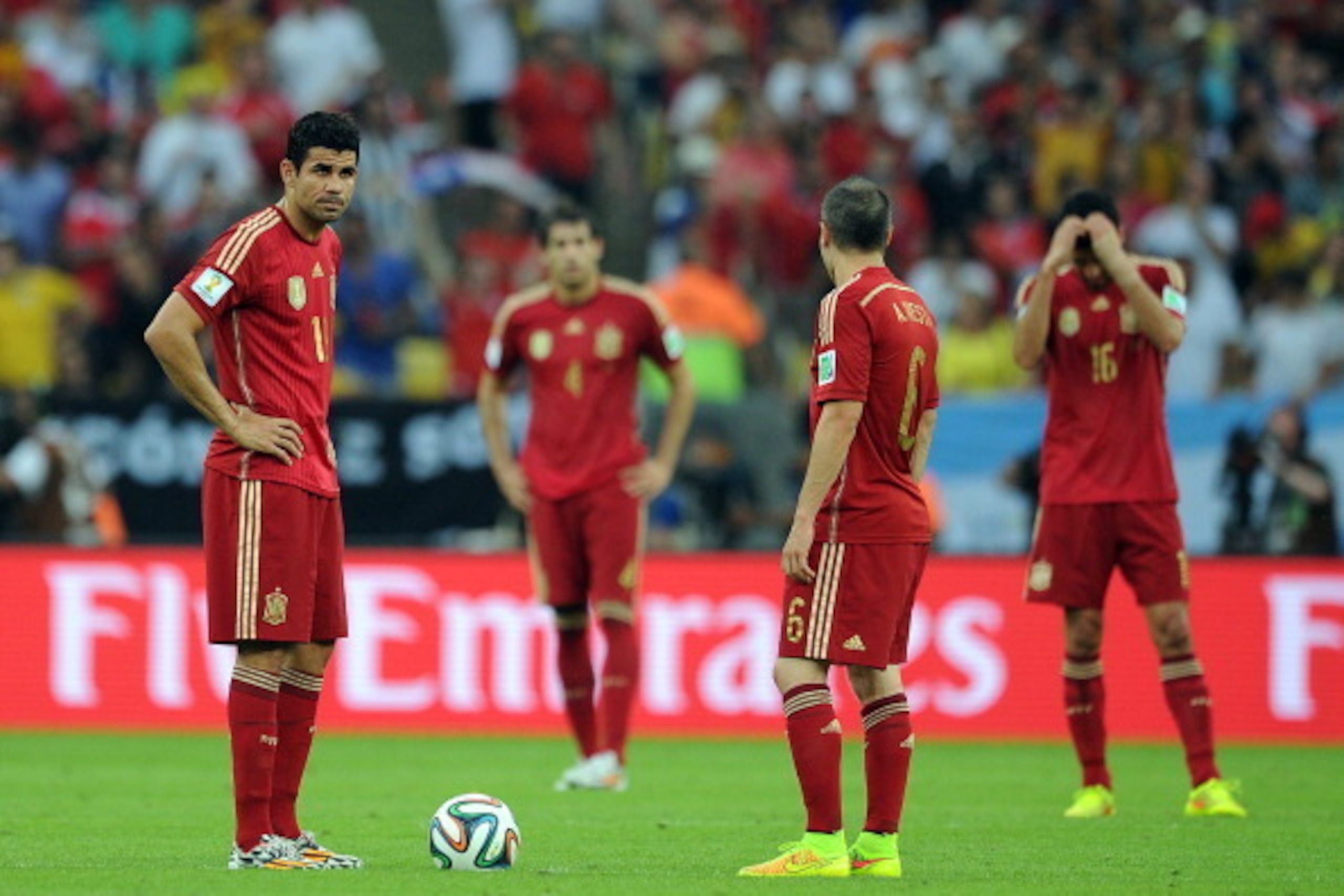 RIO DE JANEIRO, BRAZIL - JUNE 18: Diego Costa (L) of Spain looks dejected as he waits to restart the match following Chile's first goal during the 2014 FIFA World Cup Brazil Group B match between Spain and Chile at Maracana Stadium on June 18, 2014 in Rio RIO DE JANEIRO, BRAZIL - JUNE 18: Diego Costa (L) of Spain looks dejected as he waits to restart the match following Chile's first goal during the 2014 FIFA World Cup Brazil Group B match between Spain and Chile at Maracana Stadium on June 18, 2014 in Rio