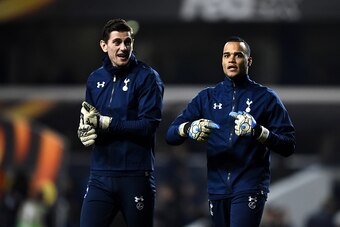 LONDON, ENGLAND - MARCH 17:  Substitute goalkeeper Michel Vorm of Tottenham Hotspur (R) warms up prior to the UEFA Europa League round of 16, second leg match between Tottenham Hotspur and Borussia Dortmund at White Hart Lane on March 17, 2016 in London, 