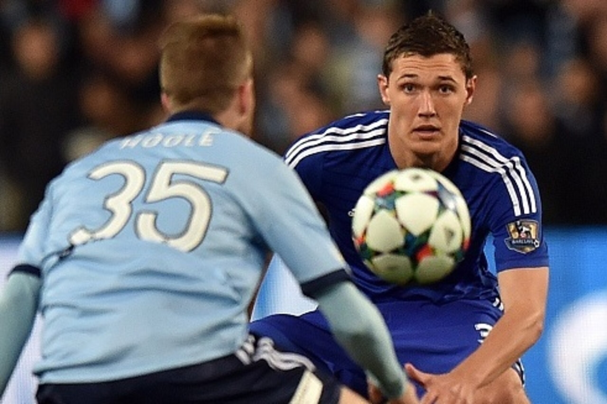 Chelsea's Andreas Christensen (R) fights for the ball with Sydney FC's Andrew Hoole during their friendly match at the ANZ Stadium in Sydney on June 2, 2015.  AFP PHOTO/ Saeed KHAN --IMAGE RESTRICTED TO EDITORIAL USE - STRICTLY NO COMMERCIAL USE--        
