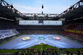MILAN, ITALY - MAY 28:  Real Madrid and Club Atletico de Madrid teams line up prior to the the UEFA Champions League Final match between Real Madrid and Club Atletico de Madrid at Stadio Giuseppe Meazza on May 28, 2016 in Milan, Italy.  (Photo by Clive Ma