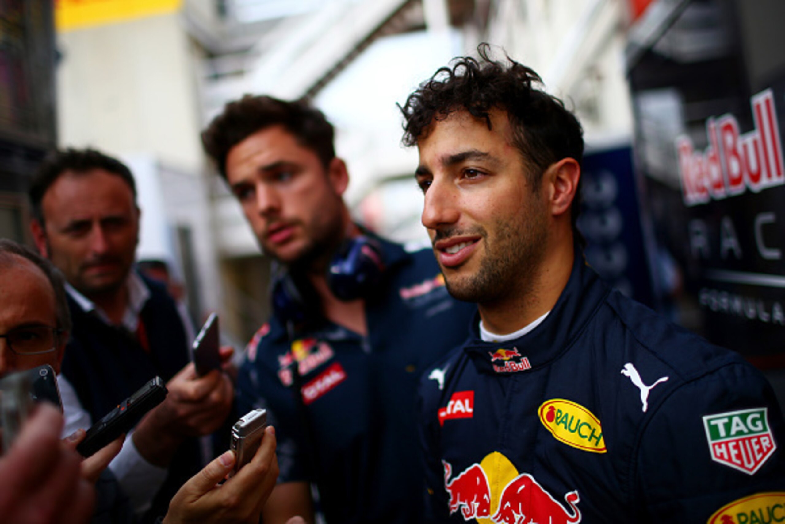 MONTMELO, SPAIN - MAY 17: Daniel Ricciardo of Australia and Red Bull Racing speaks with members of the media after day one of Formula One testing at Circuit de Catalunya on May 17, 2016 in Montmelo, Spain. (Photo by Dan Istitene/Getty Images) MONTMELO, SPAIN - MAY 17: Daniel Ricciardo of Australia and Red Bull Racing speaks with members of the media after day one of Formula One testing at Circuit de Catalunya on May 17, 2016 in Montmelo, Spain. (Photo by Dan Istitene/Getty Images)