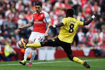 LONDON, UNITED KINGDOM - MAY 15:  Hector Bellerin of Arsenal and Idrissa Gueye of Aston Villa compete for the ball during the Barclays Premier League match between Arsenal and Aston Villa at Emirates Stadium on May 15, 2016 in London, England.  (Photo by 