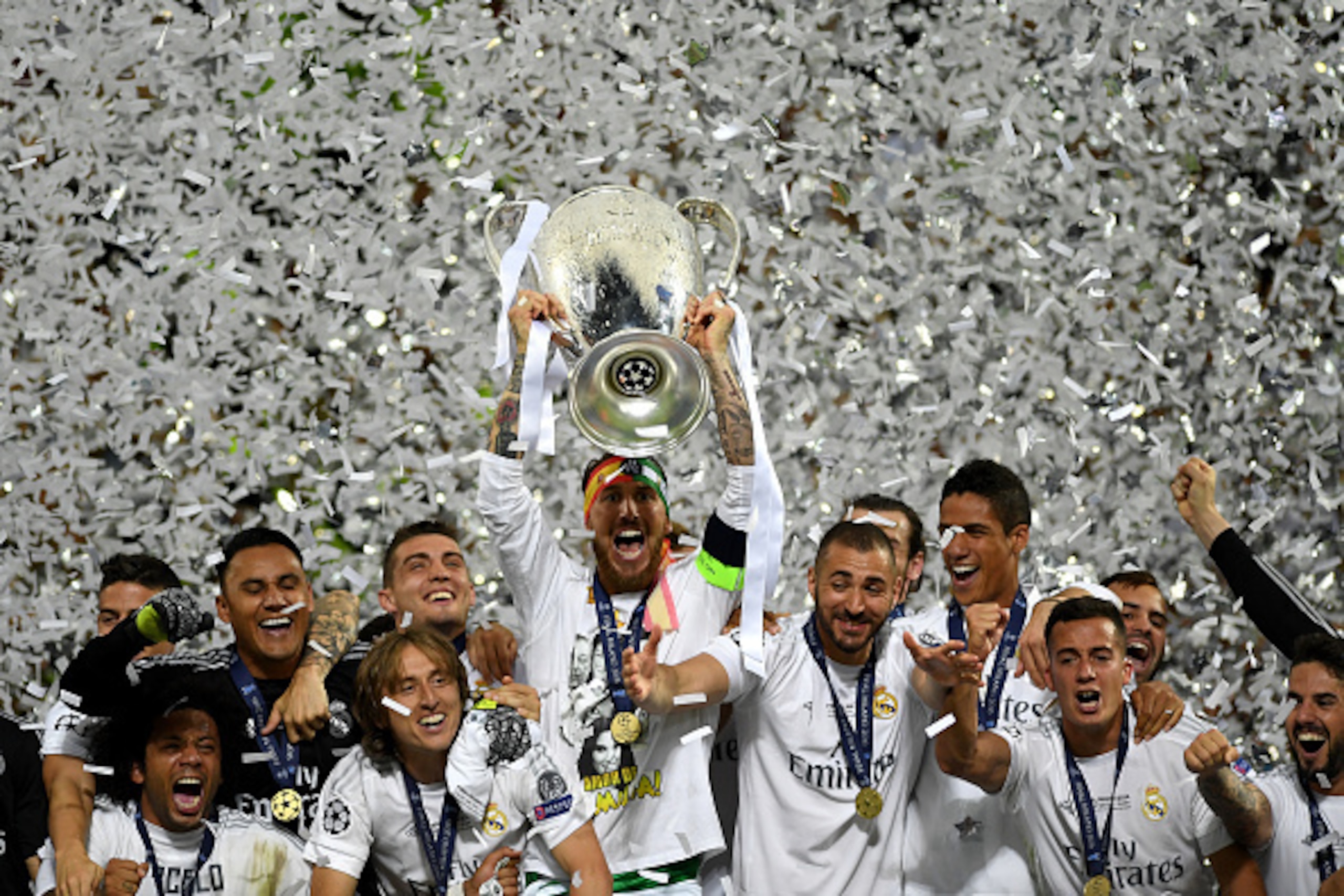 MILAN, ITALY - MAY 28: Sergio Ramos of Real Madrid of Real Madrid lifts the Champions League trophy after the UEFA Champions League Final match between Real Madrid and Club Atletico de Madrid at Stadio Giuseppe Meazza on May 28, 2016 in Milan, Italy. (P MILAN, ITALY - MAY 28: Sergio Ramos of Real Madrid of Real Madrid lifts the Champions League trophy after the UEFA Champions League Final match between Real Madrid and Club Atletico de Madrid at Stadio Giuseppe Meazza on May 28, 2016 in Milan, Italy. (P