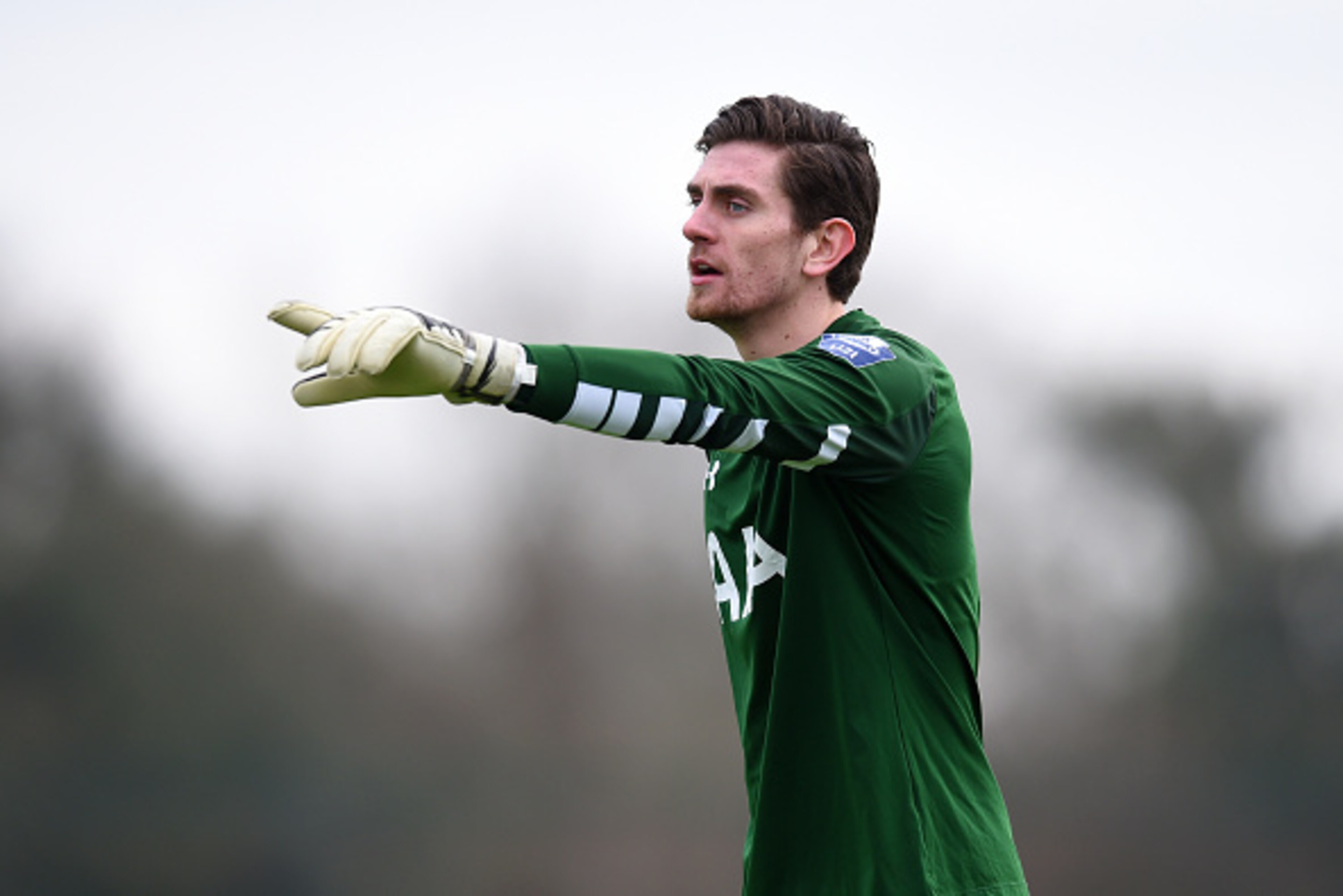 ENFIELD, ENGLAND - JANUARY 18: Luke McGee of Tottenham Hotspur signals to his team-mates during the Barclays U21 Premier League match between Tottenham Hotspur and Manchester City at Tottenham Hotspur Training Centre on January 18, 2016 in Enfield, Engla ENFIELD, ENGLAND - JANUARY 18: Luke McGee of Tottenham Hotspur signals to his team-mates during the Barclays U21 Premier League match between Tottenham Hotspur and Manchester City at Tottenham Hotspur Training Centre on January 18, 2016 in Enfield, Engla