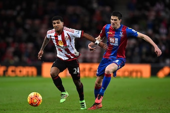 SUNDERLAND, ENGLAND - MARCH 01:  Sunderland player DeAndre Yedlin (l) holds off the challenge of Martin Kelly of Palace during the Barclays Premier League match between Sunderland and Crystal Palace at Stadium of Light on March 1, 2016 in Sunderland, Engl