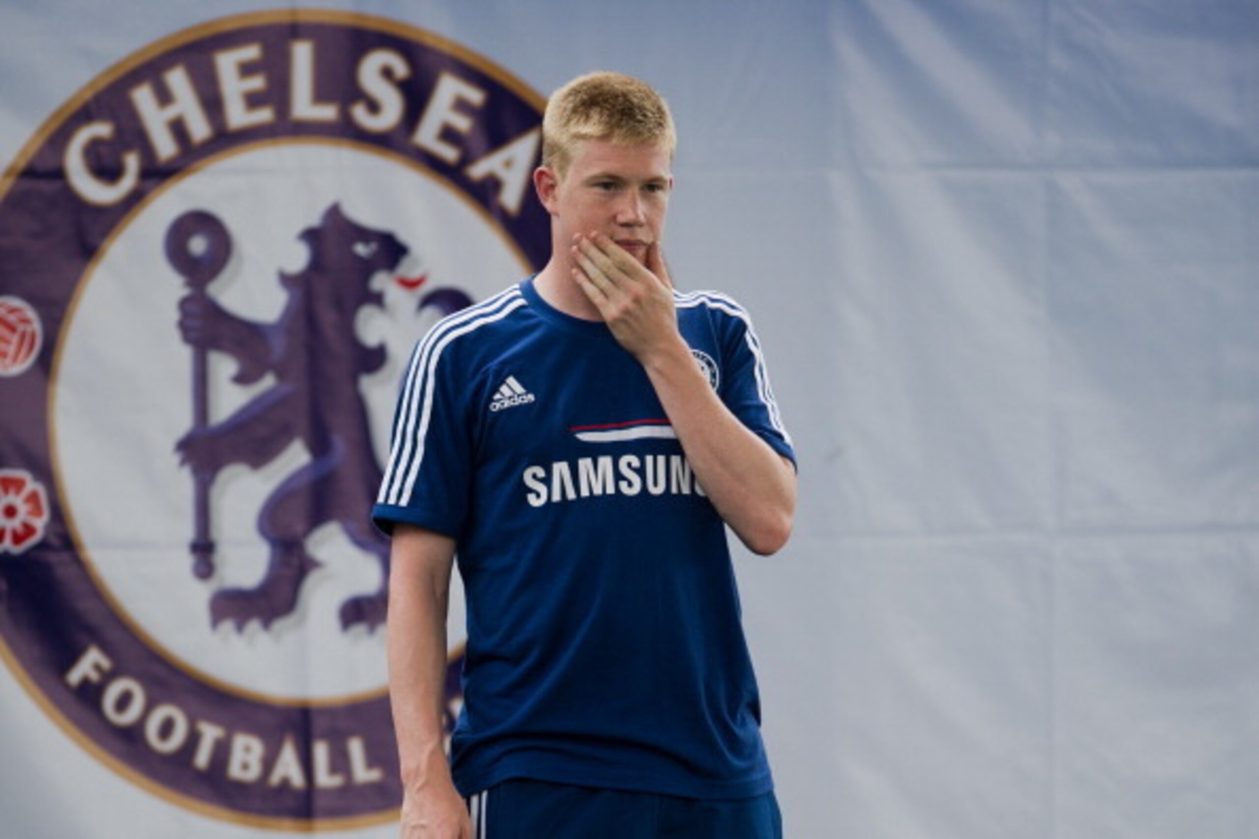 Chelsea football player Kevin De Bruyne gestures during an exhibition training with Thai children at the super kick stadium in Bangkok on July 12, 2013.  Jose Mourinho has warned that he is returning to Chelsea as a much better manager as he bids to win b