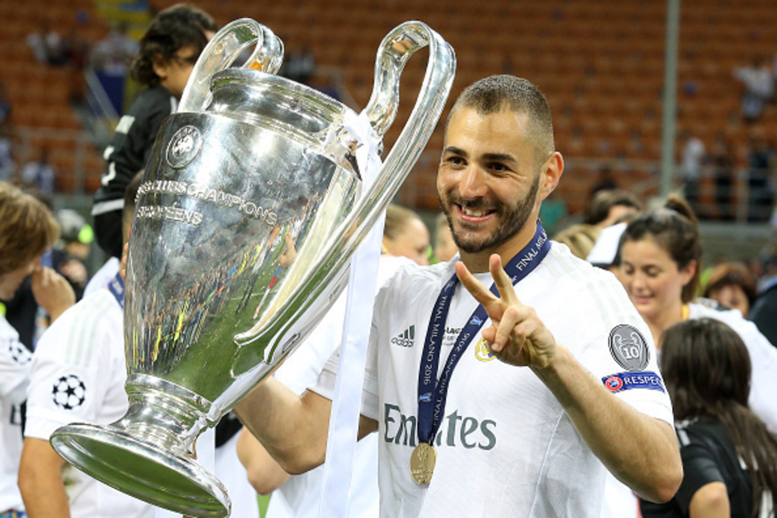 MILAN, ITALY - MAY 28: Karim Benzema of Real Madrid celebrates winning the UEFA Champions League final between Real Madrid and Club Atletico Madrid at Stadio Giuseppe Meazza, San Siro on May 28, 2016 in Milan, Italy. (Photo by Jean Catuffe/Getty Images)