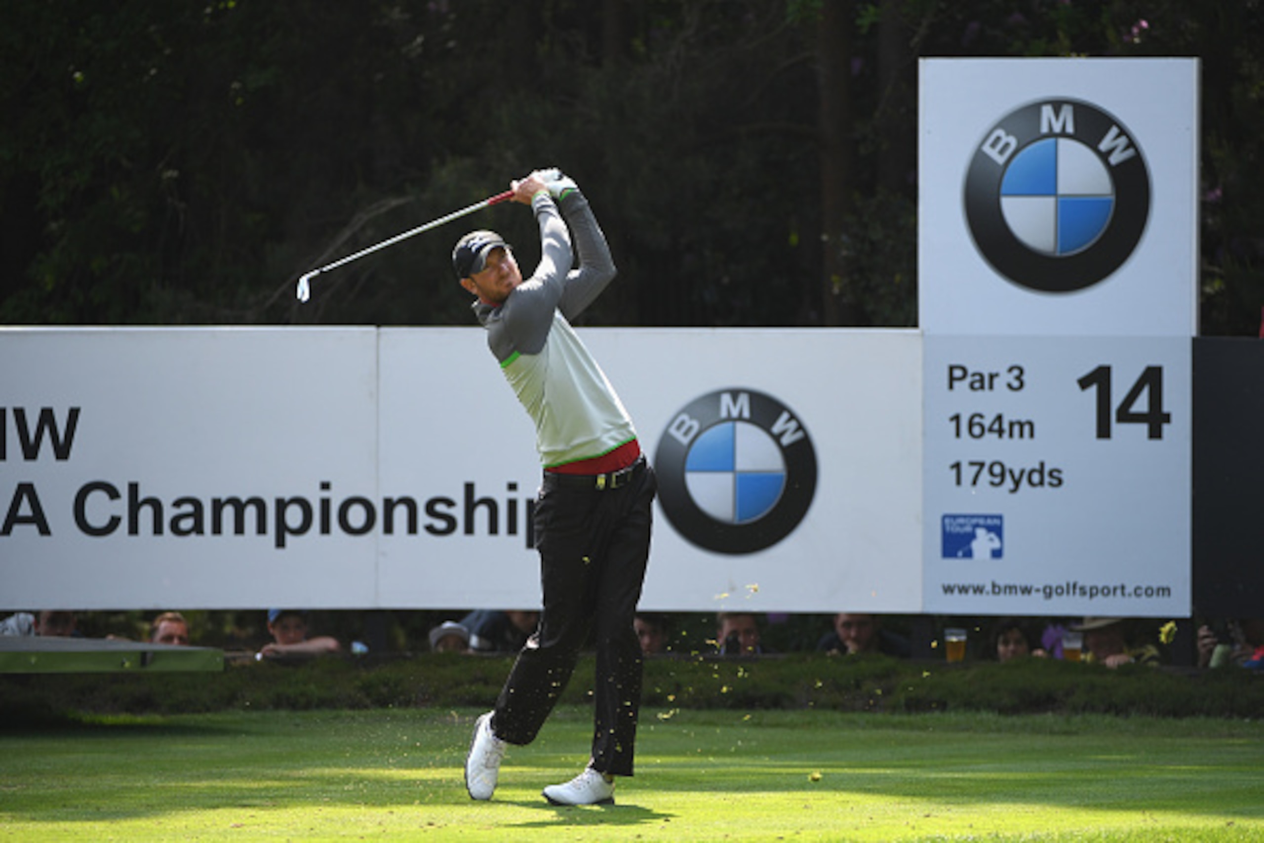 VIRGINIA WATER, ENGLAND - MAY 29: Chris Wood of England tees off on the 14th hole during day four of the BMW PGA Championship at Wentworth on May 29, 2016 in Virginia Water, England.  (Photo by Ross Kinnaird/Getty Images)