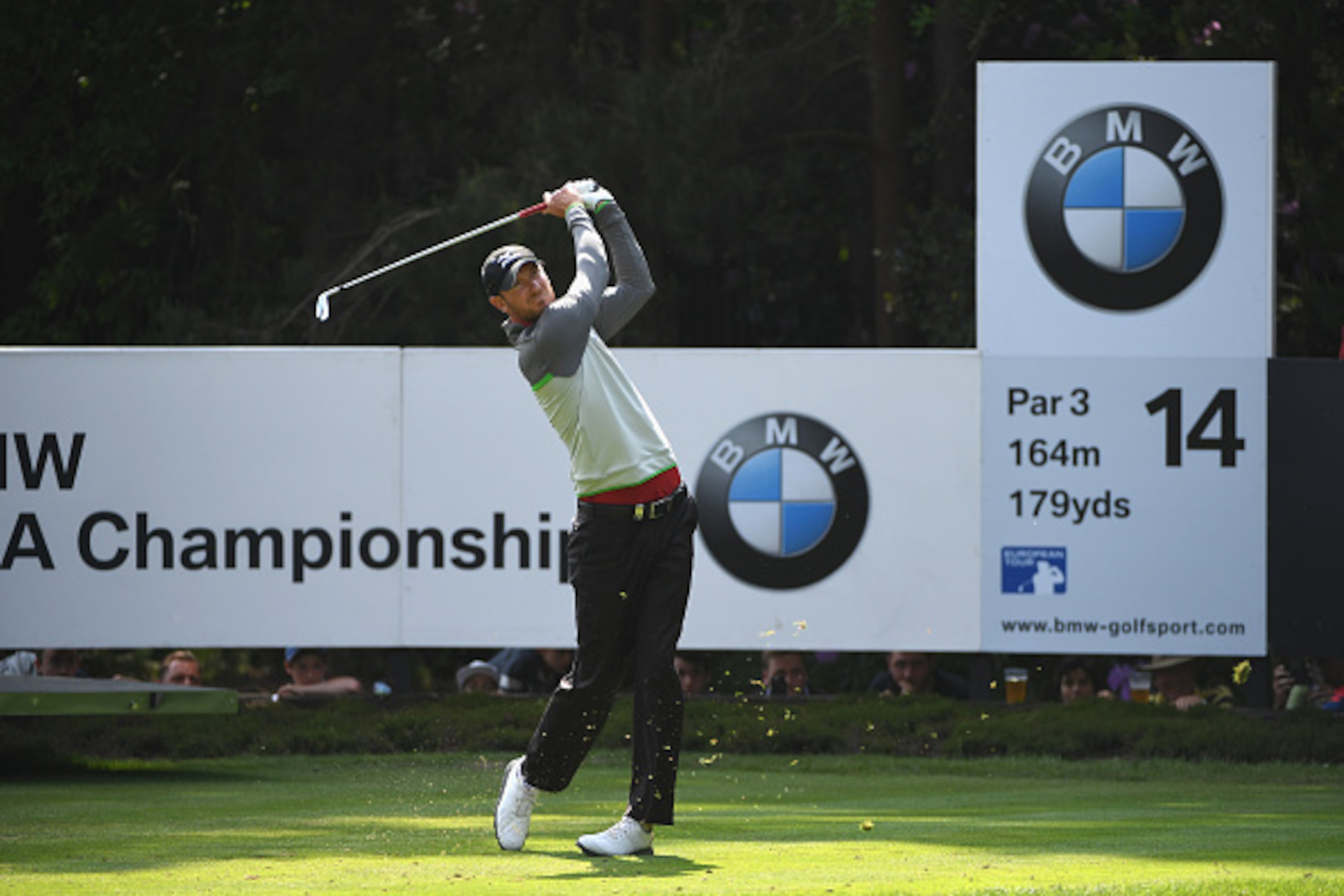 VIRGINIA WATER, ENGLAND - MAY 29: Chris Wood of England tees off on the 14th hole during day four of the BMW PGA Championship at Wentworth on May 29, 2016 in Virginia Water, England.  (Photo by Ross Kinnaird/Getty Images)