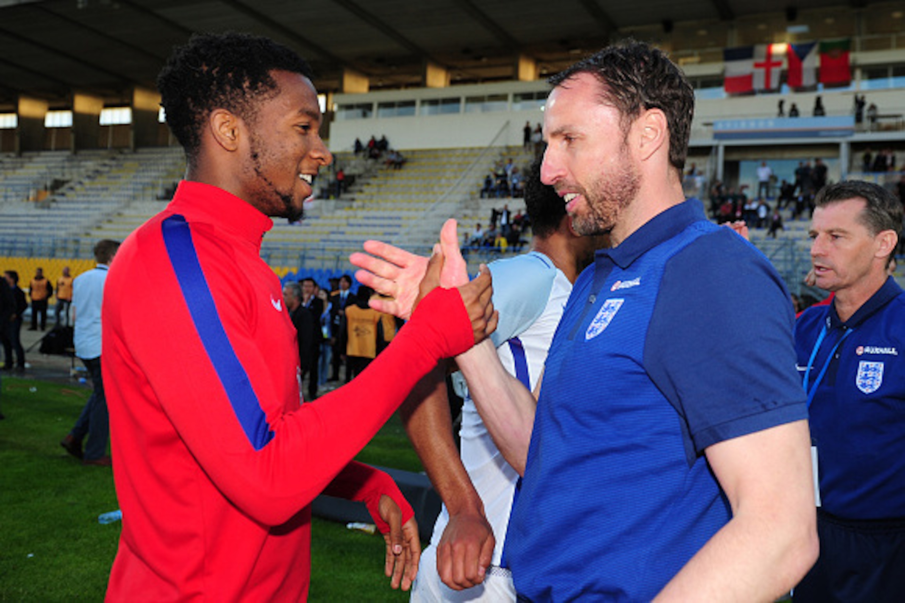 AVIGNON, FRANCE - MAY 29: Kasey Palmer of England(L) celebrates with Gareth Southgate, Coach of England during the Final of the Toulon Tournament between England and France at Parc Des Sports on May 29, 2016 in Avignon, France. (Photo by Harry Trump/Getty