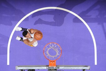 LOS ANGELES, CA - MARCH 6:  Jordan Clarkson #6 of the Los Angeles Lakers goes up for a dunk against the Golden State Warriors on March 6, 2016 at STAPLES Center in Los Angeles, California. NOTE TO USER: User expressly acknowledges and agrees that, by down