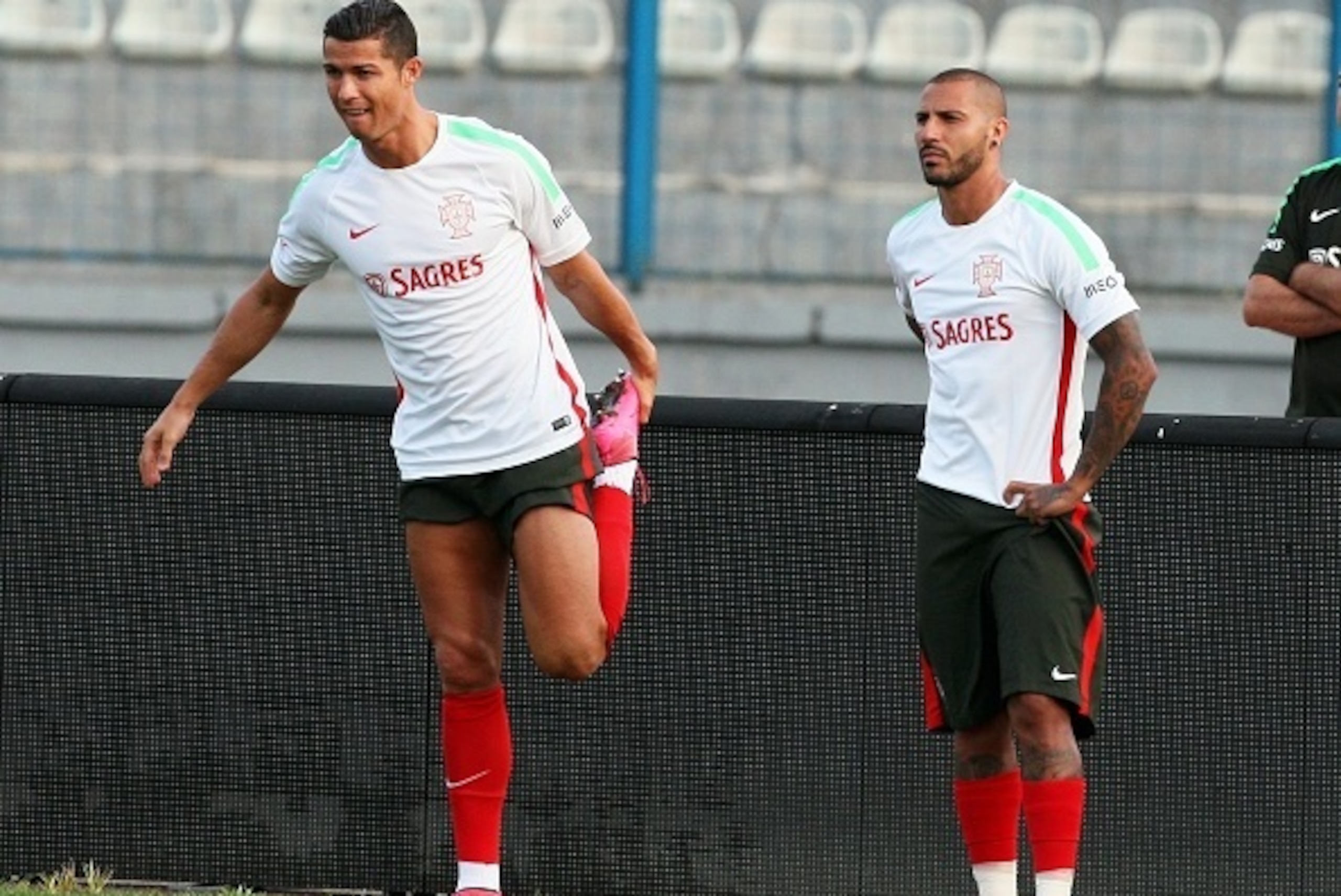 Portuguese national team players Cristiano Ronaldo (L) and Ricardo Quaresma (R) take part in a training session at Qemal Stafa stadium in Tirana on September 6, 2015, on the eve the UEFA Euro 2016 Group I qualifying football match between Albania and Port