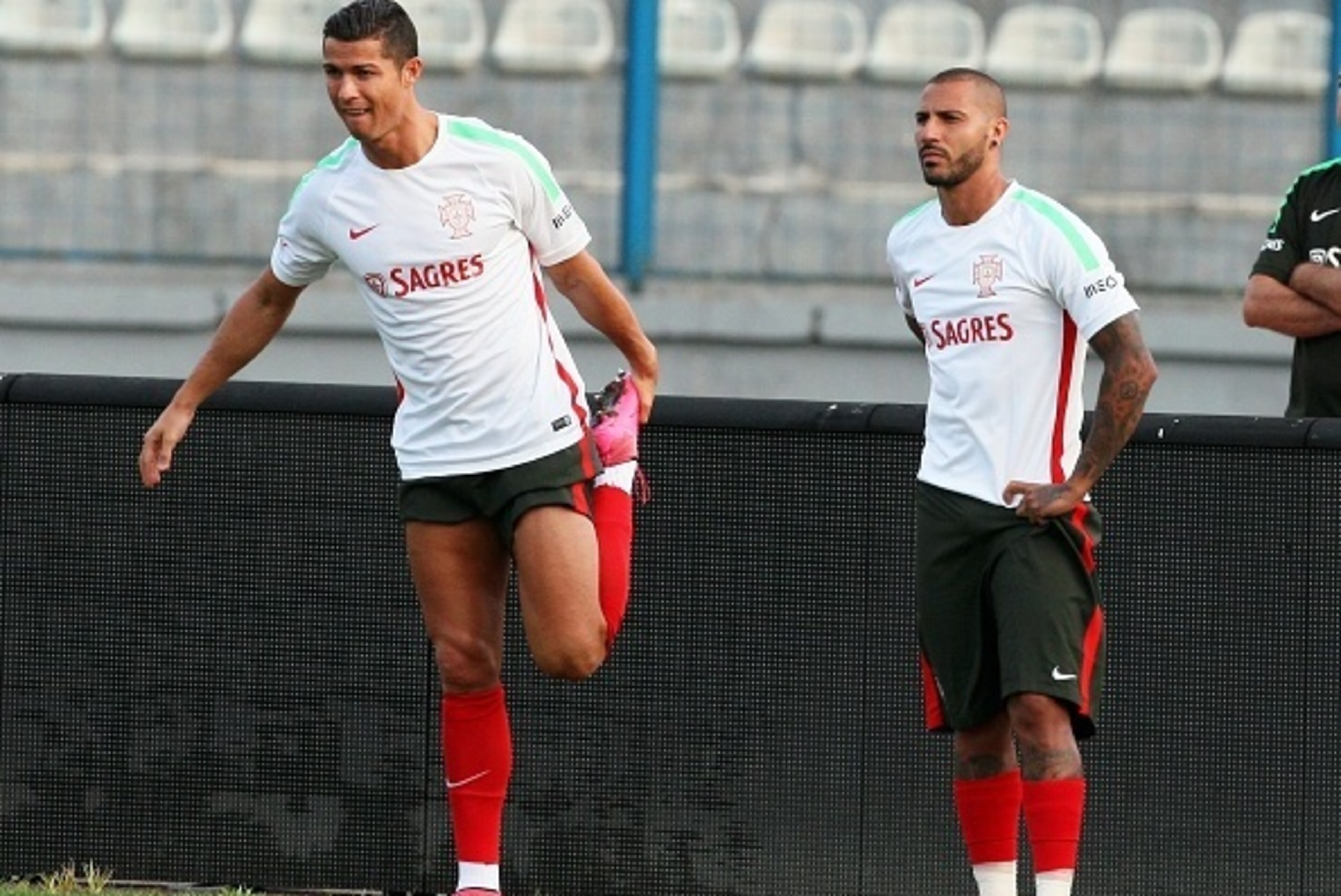 Portuguese national team players Cristiano Ronaldo (L) and Ricardo Quaresma (R) take part in a training session at Qemal Stafa stadium in Tirana on September 6, 2015, on the eve the UEFA Euro 2016 Group I qualifying football match between Albania and Port