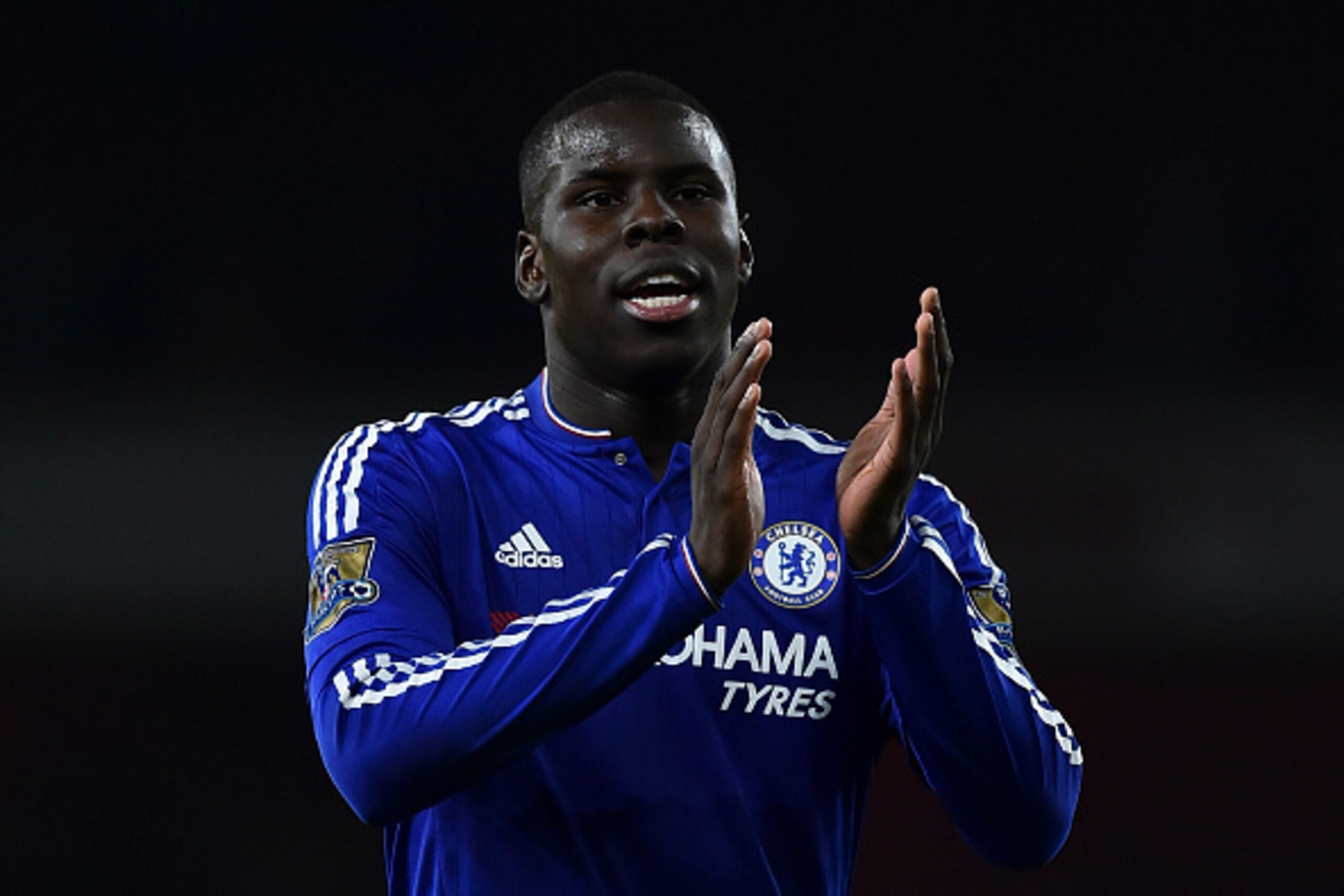 Chelsea's French defender Kurt Zouma applauds supporters after the English Premier League football match between Arsenal and Chelsea at the Emirates Stadium in London on January 24, 2016. Chelsea won the game 1-0. AFP PHOTO / BEN STANSALL

 / AFP / BEN ST