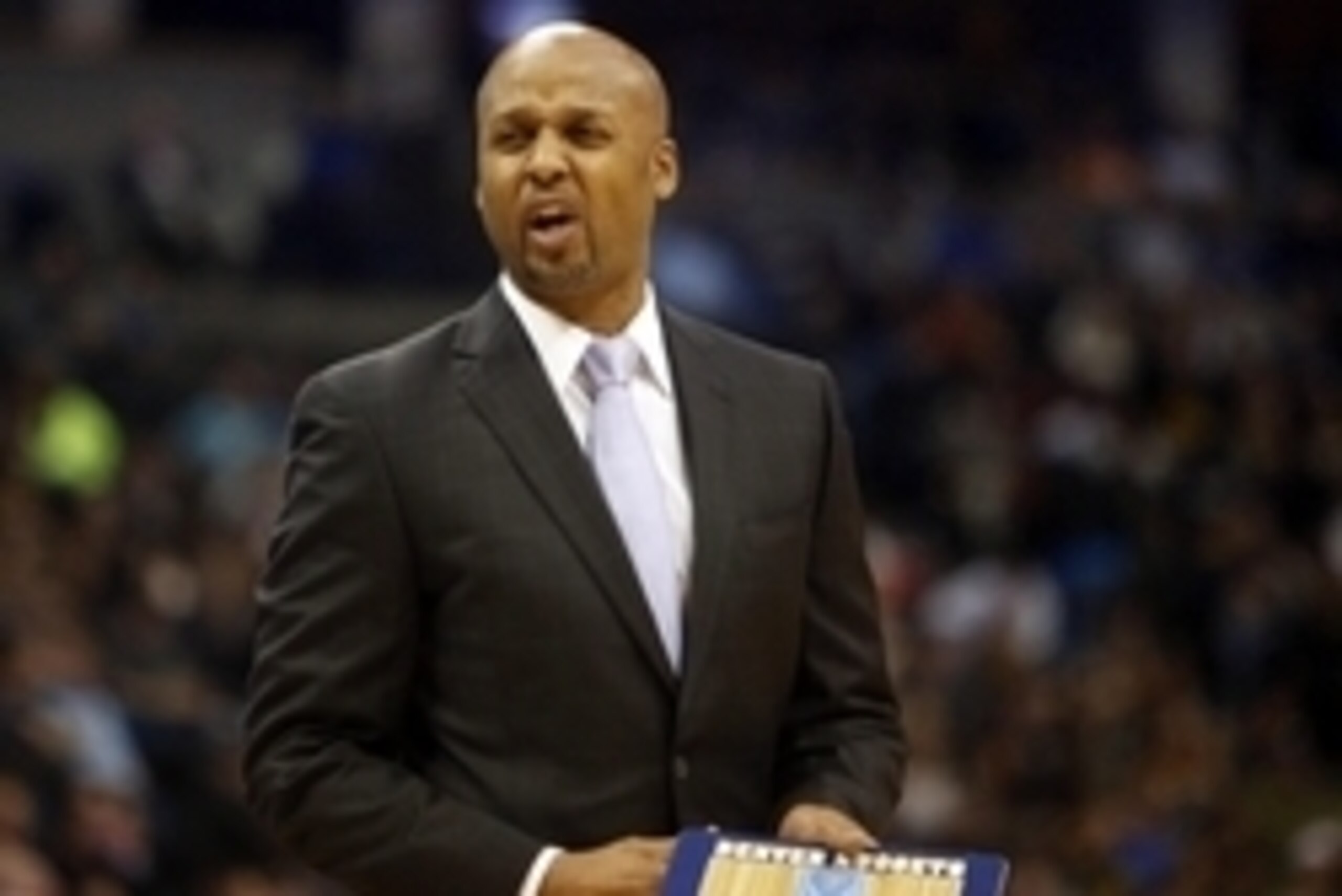 Mar 1, 2015; Denver, CO, USA; Denver Nuggets head coach Brian Shaw reacts during the first half against the New Orleans Pelicans at Pepsi Center. Mandatory Credit: Chris Humphreys-USA TODAY Sports