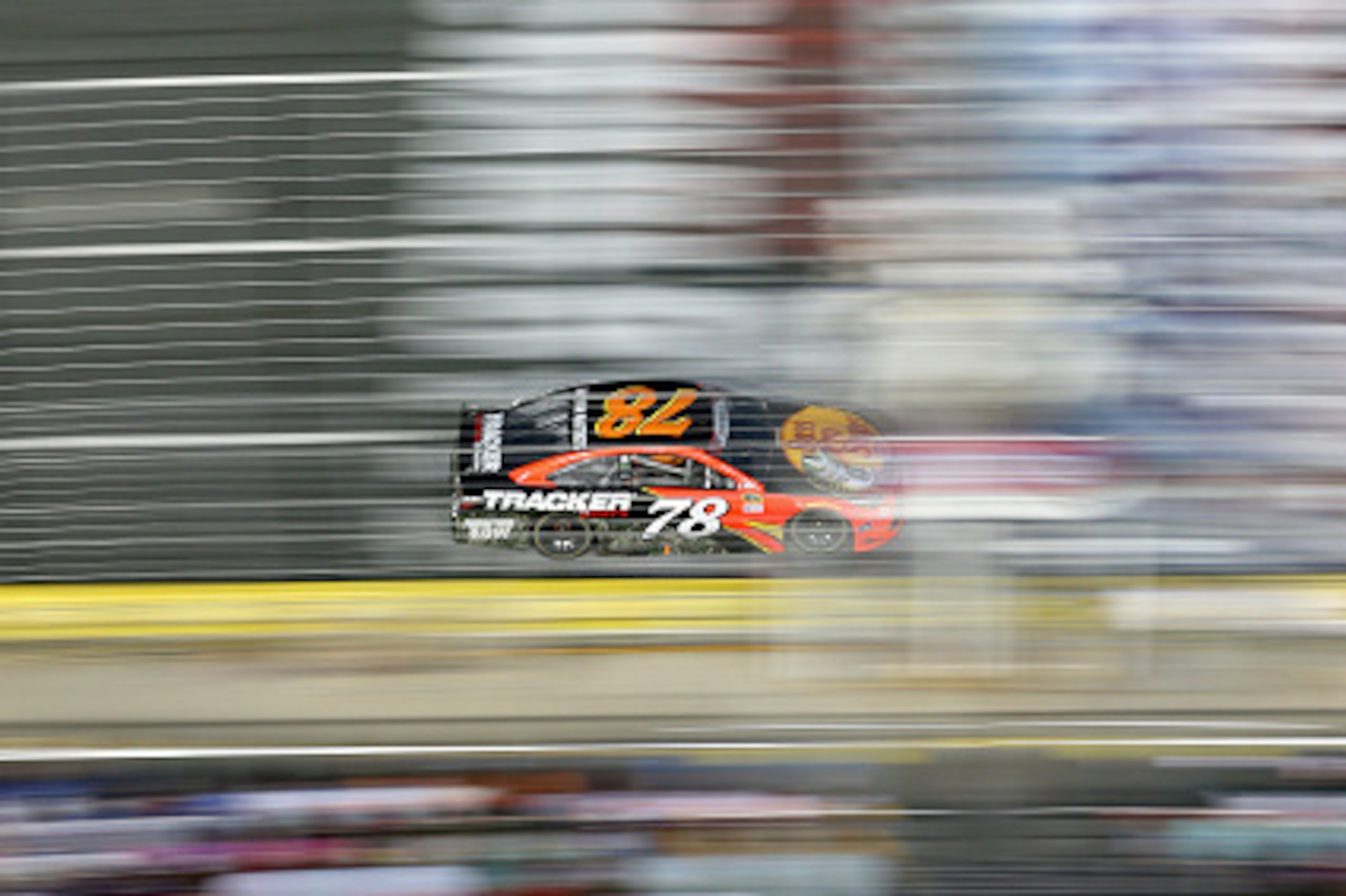 CHARLOTTE, NC - MAY 29: Martin Truex Jr., driver of the #78 Bass Pro Shops/Tracker Toyota, races during the NASCAR Sprint Cup Series Coca-Cola 600 at Charlotte Motor Speedway on May 29, 2016 in Charlotte, North Carolina.  (Photo by Streeter Lecka/Getty Im