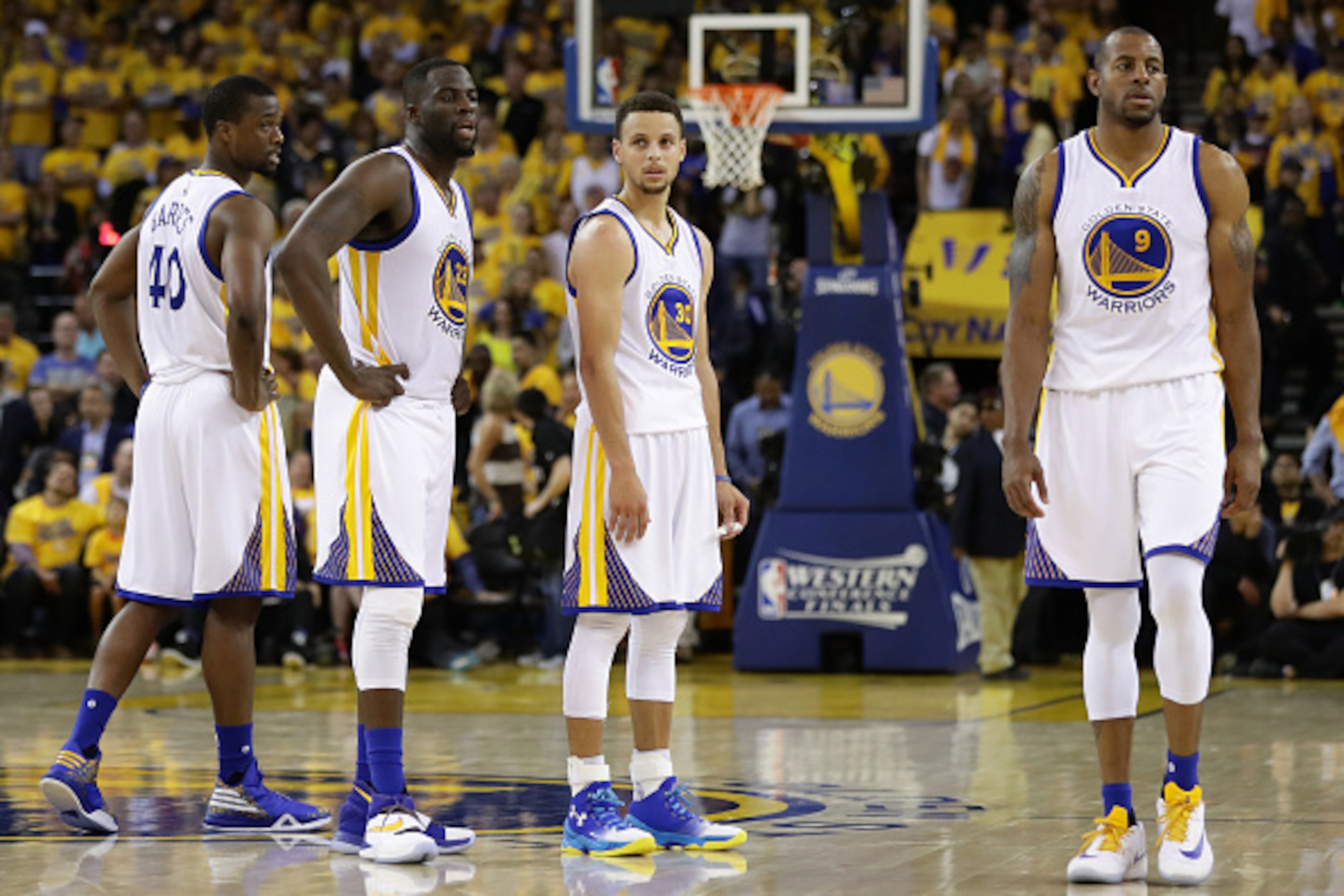 OAKLAND, CA - MAY 26: (L-R) Harrison Barnes #40, Draymond Green #23, Stephen Curry #30 and Andre Iguodala #9 of the Golden State Warriors stand on the court during Game Five of the Western Conference Finals against the Oklahoma City Thunder during the 20 OAKLAND, CA - MAY 26: (L-R) Harrison Barnes #40, Draymond Green #23, Stephen Curry #30 and Andre Iguodala #9 of the Golden State Warriors stand on the court during Game Five of the Western Conference Finals against the Oklahoma City Thunder during the 20