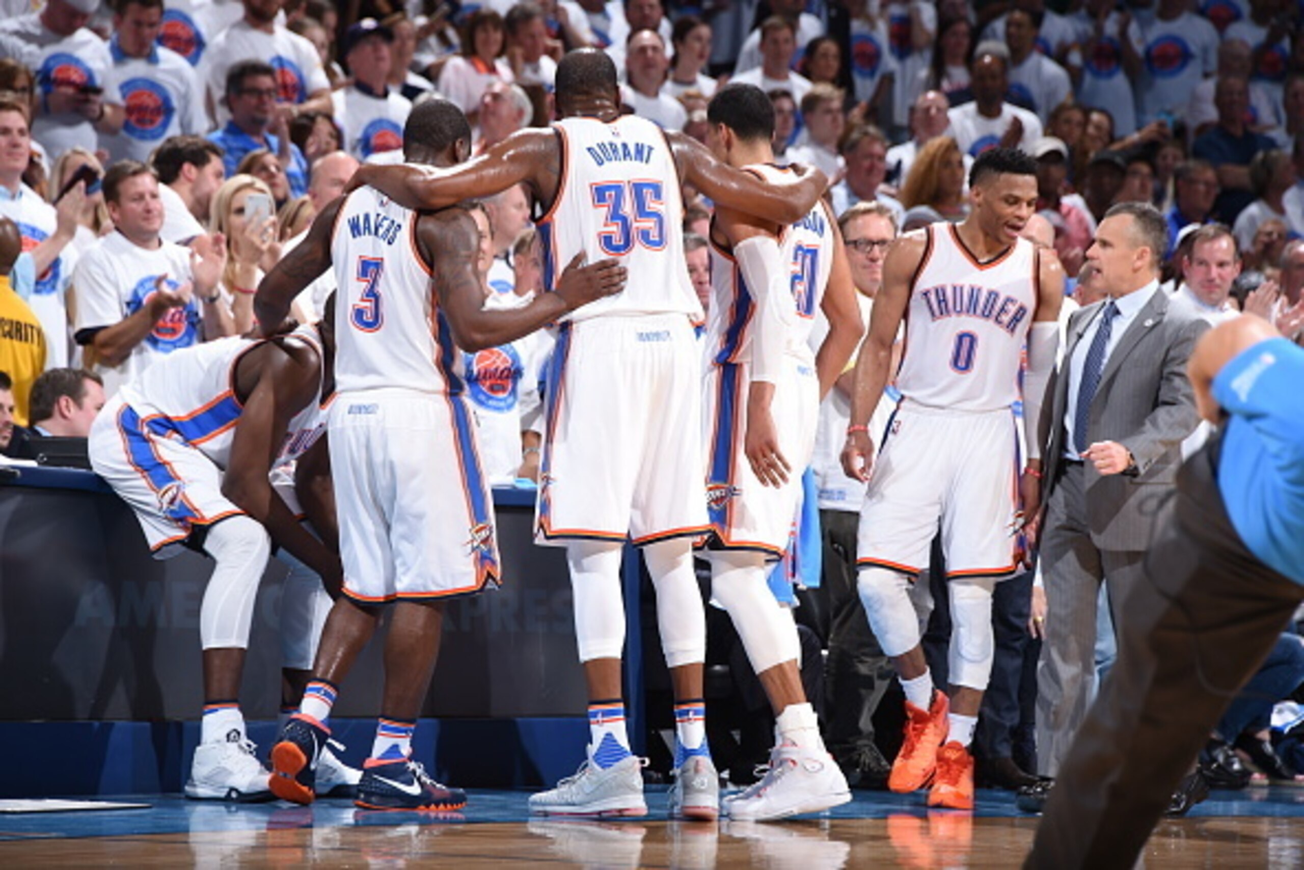 OKLAHOMA CITY, OK - MAY 24: Kevin Durant #35, Dion Waiters #3 and Andre Roberson #21 of the Oklahoma City Thunder huddle after a play against the Golden State Warriors during Game Four of the Western Conference Finals during the 2016 NBA Playoffs on May 2