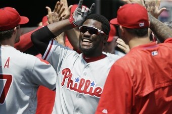 Herrera celebrates with the horns sign, which comes from his nickname, El Torito.
