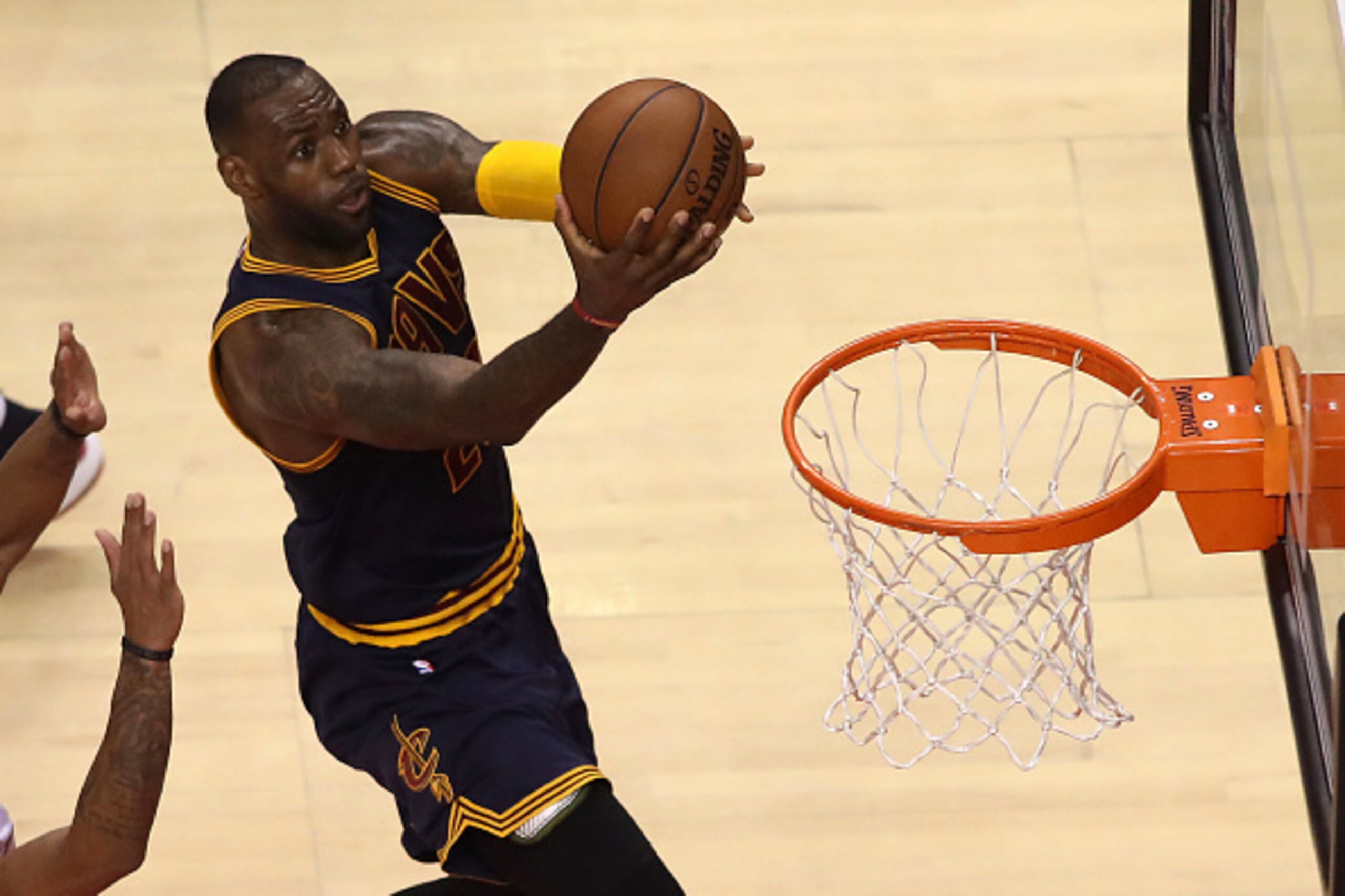 TORONTO, CANADA - MAY 27: LeBron James #23 of the Cleveland Cavaliers lays the ball up against the Toronto Raptors in Game Six of the Eastern Conference Finals during the 2016 NBA Playoffs on May 27, 2016 at the Air Canada Centre in Toronto, Ontario, Can TORONTO, CANADA - MAY 27: LeBron James #23 of the Cleveland Cavaliers lays the ball up against the Toronto Raptors in Game Six of the Eastern Conference Finals during the 2016 NBA Playoffs on May 27, 2016 at the Air Canada Centre in Toronto, Ontario, Can
