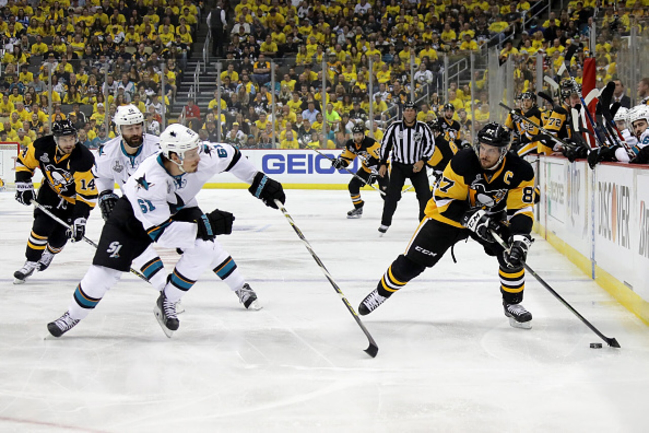 PITTSBURGH, PA - MAY 30:  Sidney Crosby #87 of the Pittsburgh Penguins skates against Justin Braun #61 of the San Jose Sharks during the first period in Game One of the 2016 NHL Stanley Cup Final at Consol Energy Center on May 30, 2016 in Pittsburgh, Penn