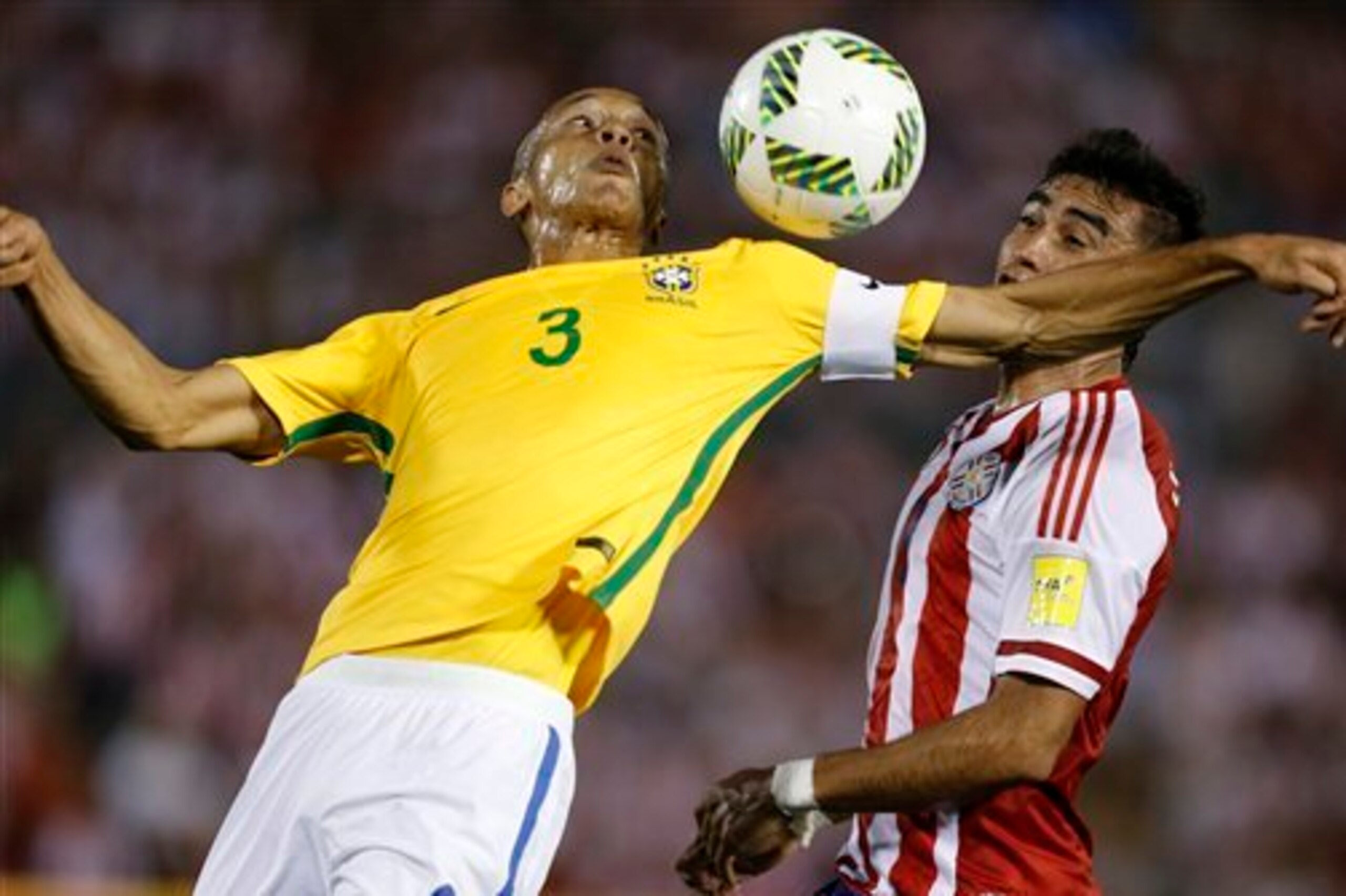 Miranda (left) has become the new rock around which the Brazil defence has been built.