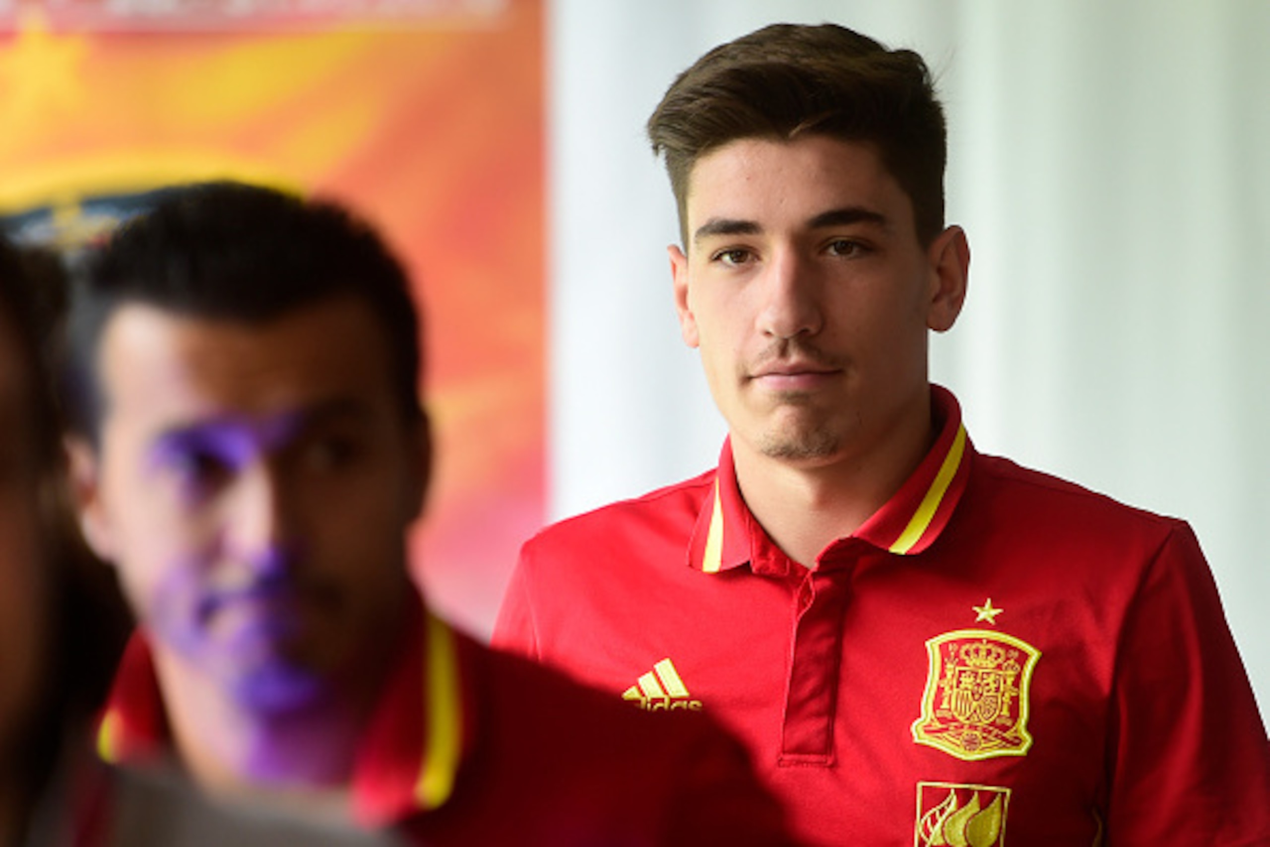 Spain's defender Hector Bellerin leaves the press conference room in Schruns on May 30, 2016 ahead of the upcoming Euro 2016 European football championships. / AFP / PIERRE-PHILIPPE MARCOU        (Photo credit should read PIERRE-PHILIPPE MARCOU/AFP/Getty 