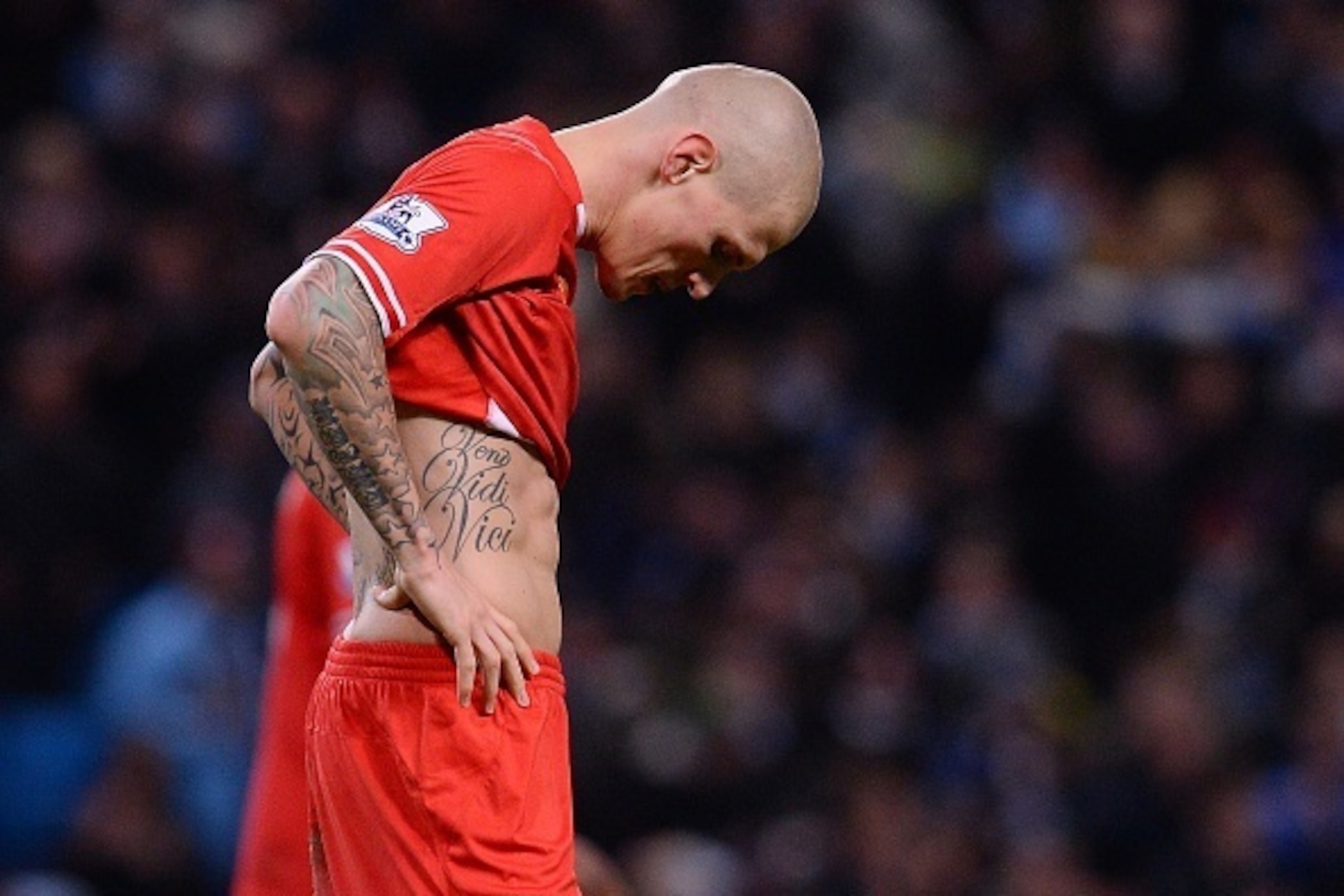 Liverpool's Slovakian defender Martin Skrtel reacts at the final whistle during the English Premier League football match between Manchester City and Liverpool at Etihad Stadium in Manchester, northwest England on December 26, 2013.  Manchester City won 2