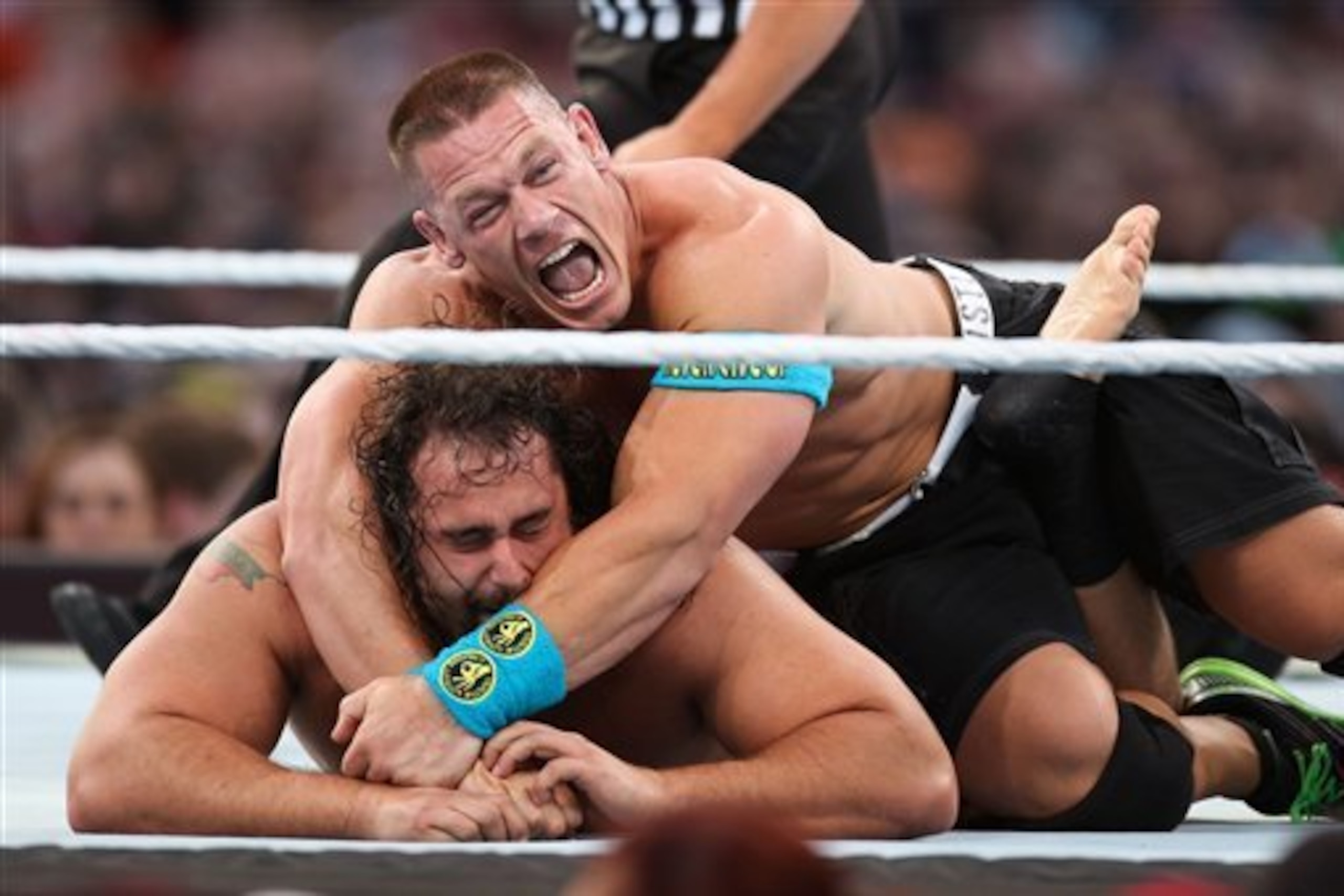 John Cena puts the STF on Rusev at WrestleMania 31.