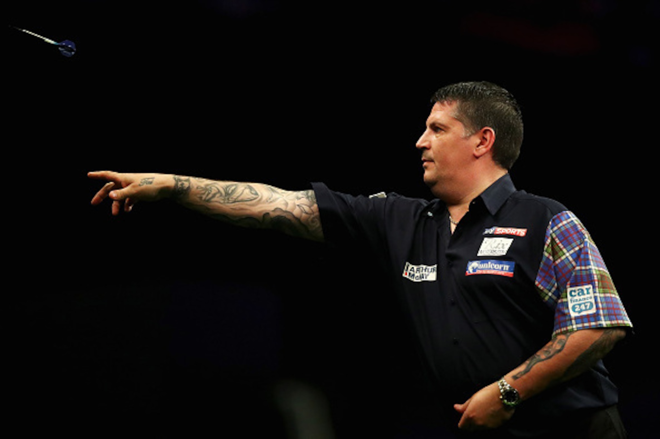 ROTTERDAM, NETHERLANDS - MAY 12:  Gary Anderson of Scotland plays a shot in his match against Adrian Lewis of England during the Darts Betway Premier League Night 15 at Rotterdam Ahoy on May 12, 2016 in Rotterdam, .  (Photo by Dean Mouhtaropoulos/Getty Im
