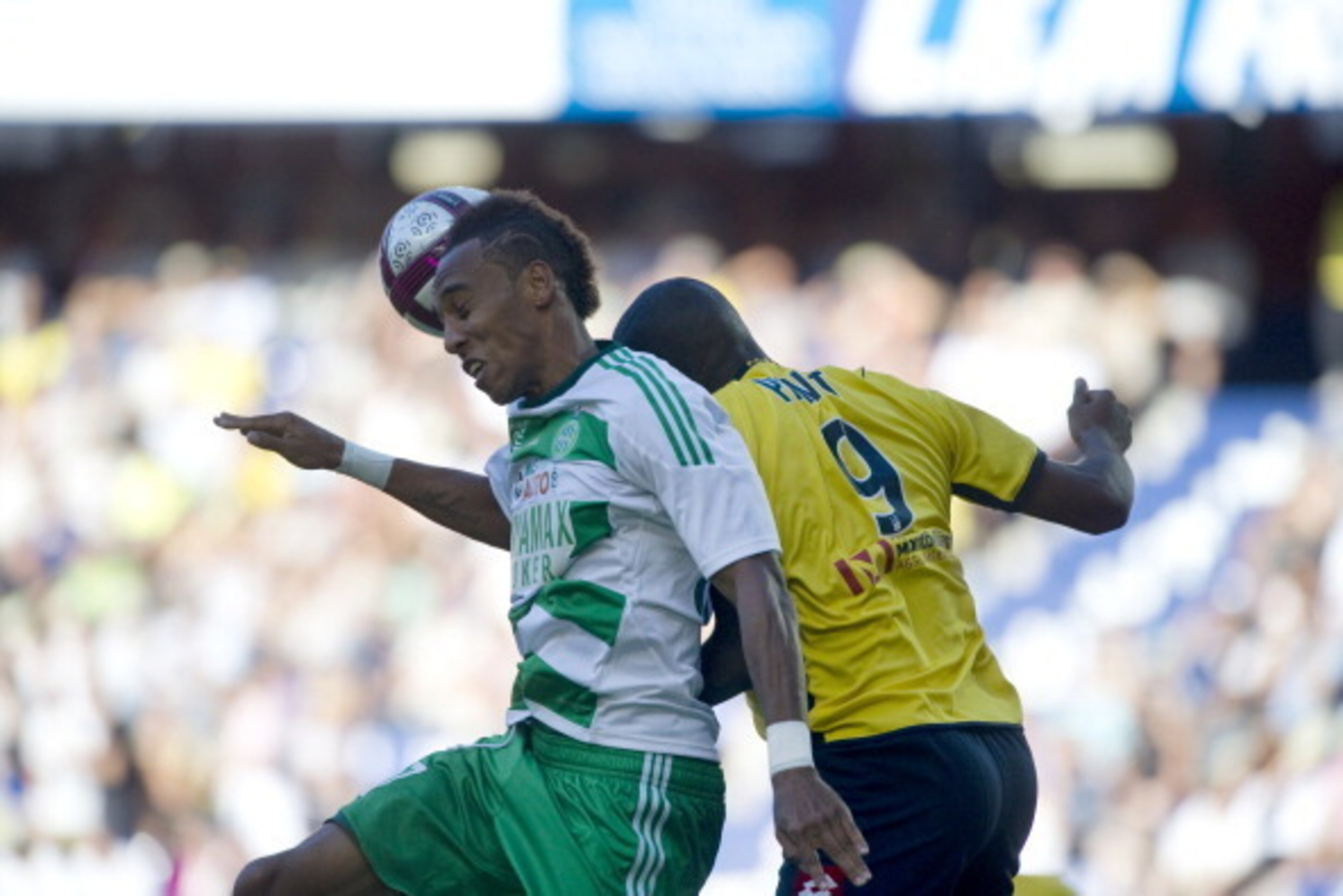 Saint-Etienne's Gabonese forward Pierre-Emerick Aubameyang (L) vies with Sochaux' French forward Sloan Privat (R) during the French L1 football match Sochaux vs St Etienne, on August 28, 2011 at the Auguste Bonal stadium in Montbeliard, eastern France. AF