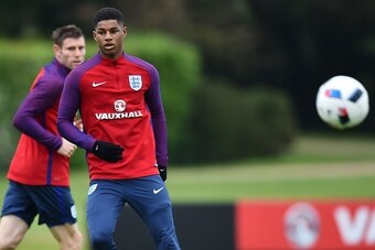 England's striker Marcus Rashford (2nd L) takes part in a team training session in Watford, north of London, on May 30, 2016.
England play against Portugal in a friendly match at London's Wembley Stadium on Thursday June 2, 2016. / AFP / BEN STANSALL / NO
