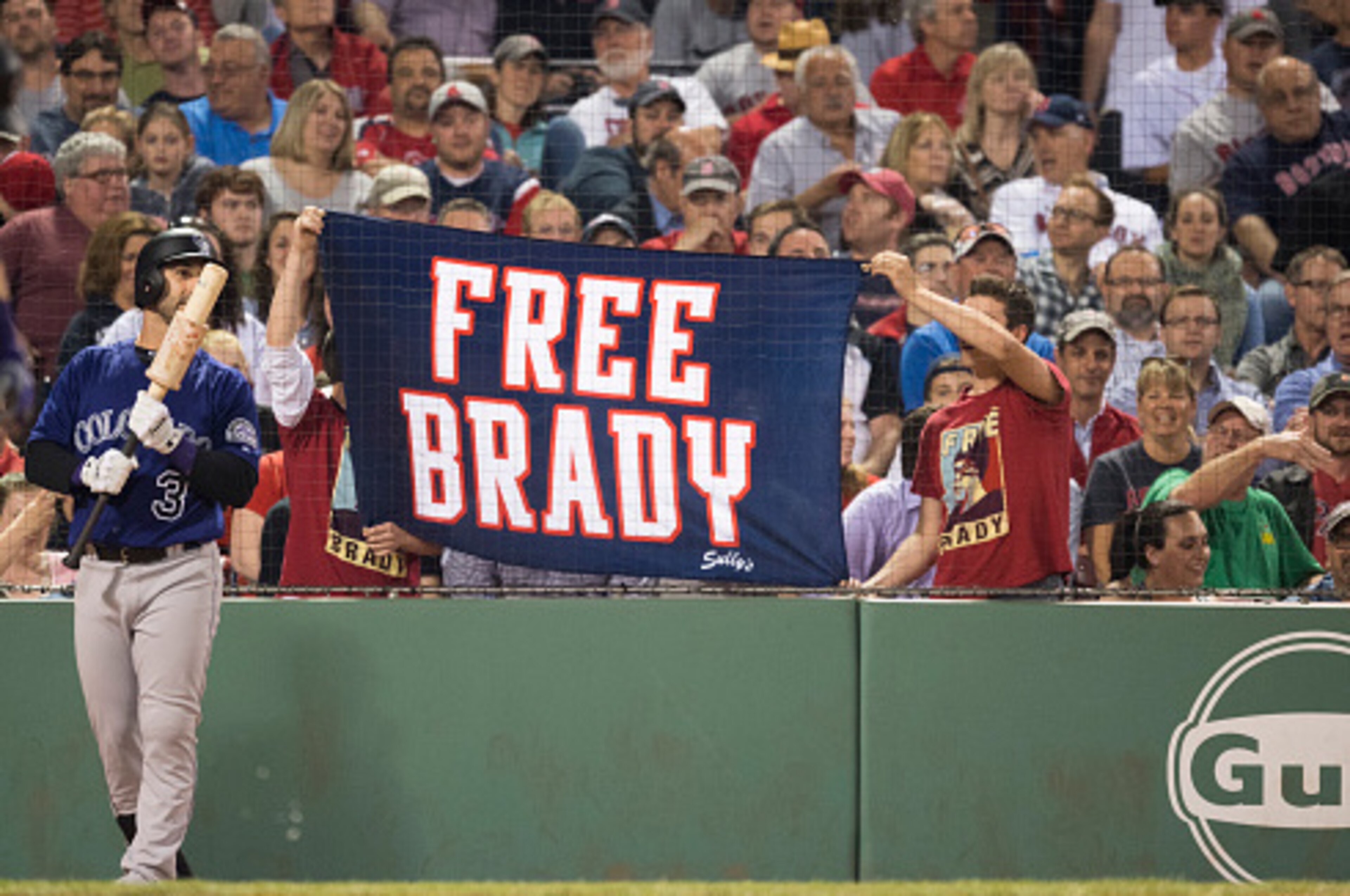 BOSTON, MA - MAY 26: Fans hold a sign in support of New England Patriots quarterback Tom Brady during a game between the Boston Red Sox and the Colorado Rockies in the eighth inning on May 26, 2016 at Fenway Park in Boston, Massachusetts. (Photo by Micha BOSTON, MA - MAY 26: Fans hold a sign in support of New England Patriots quarterback Tom Brady during a game between the Boston Red Sox and the Colorado Rockies in the eighth inning on May 26, 2016 at Fenway Park in Boston, Massachusetts. (Photo by Micha