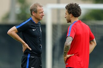 MIAMI SHORES, FL - MAY 18: Head coach Jurgen Klinsmann talks to Fabian Johnson of the U.S. Men's National team during a training session on May 18, 2016 at Buccaneer Field on the campus of Barry University in Miami Shores, Florida. (Photo by Joel Auerbach