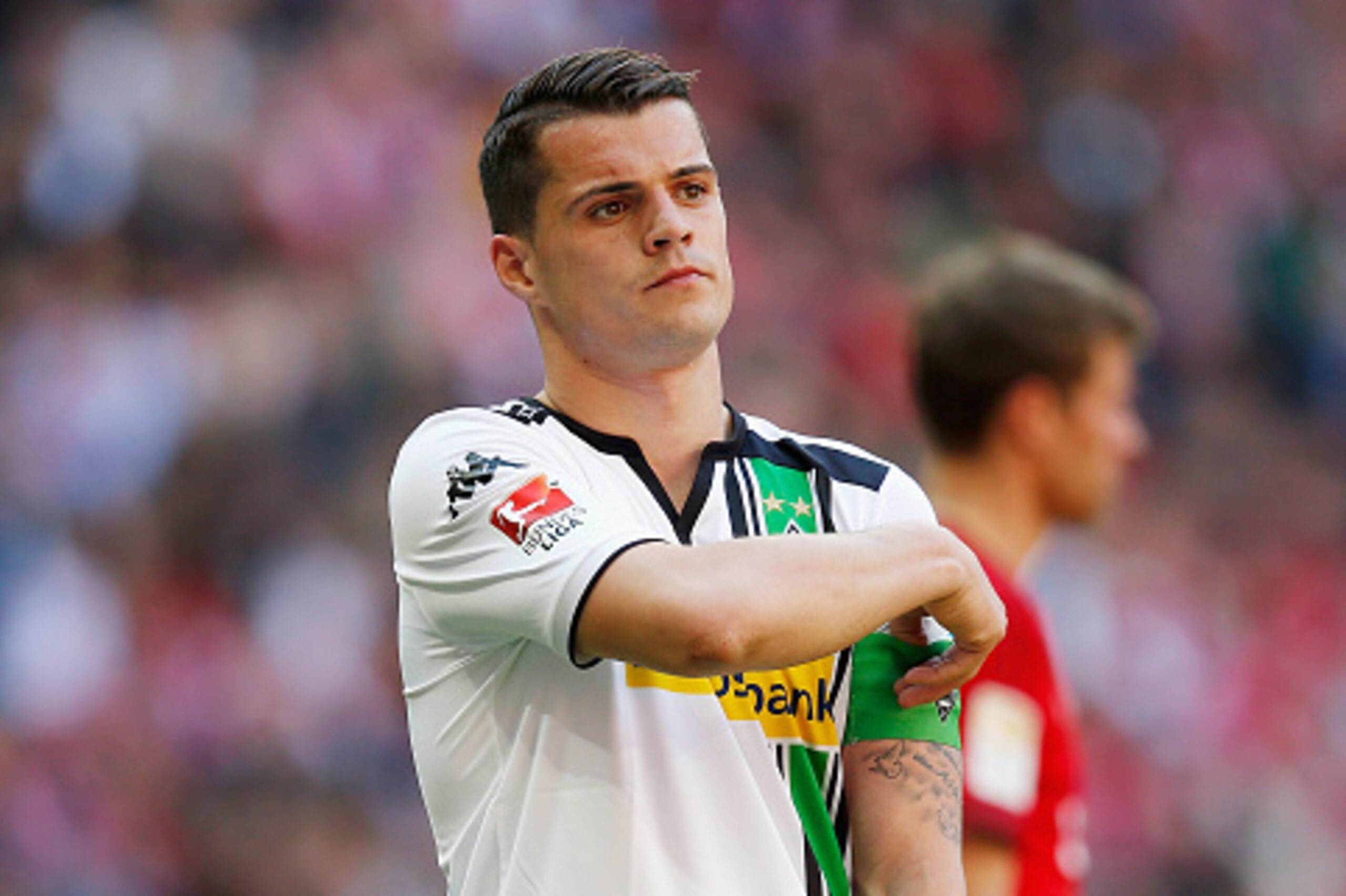 MUNICH, GERMANY - APRIL 30: Granit Xhaka of Borussia Moenchengladbach reacts during the Bundesliga match between Bayern Muenchen and Borussia Moenchengladbach at Allianz Arena on April 30, 2016 in Munich, Germany. (Photo by Boris Streubel/Getty Images) MUNICH, GERMANY - APRIL 30: Granit Xhaka of Borussia Moenchengladbach reacts during the Bundesliga match between Bayern Muenchen and Borussia Moenchengladbach at Allianz Arena on April 30, 2016 in Munich, Germany. (Photo by Boris Streubel/Getty Images)