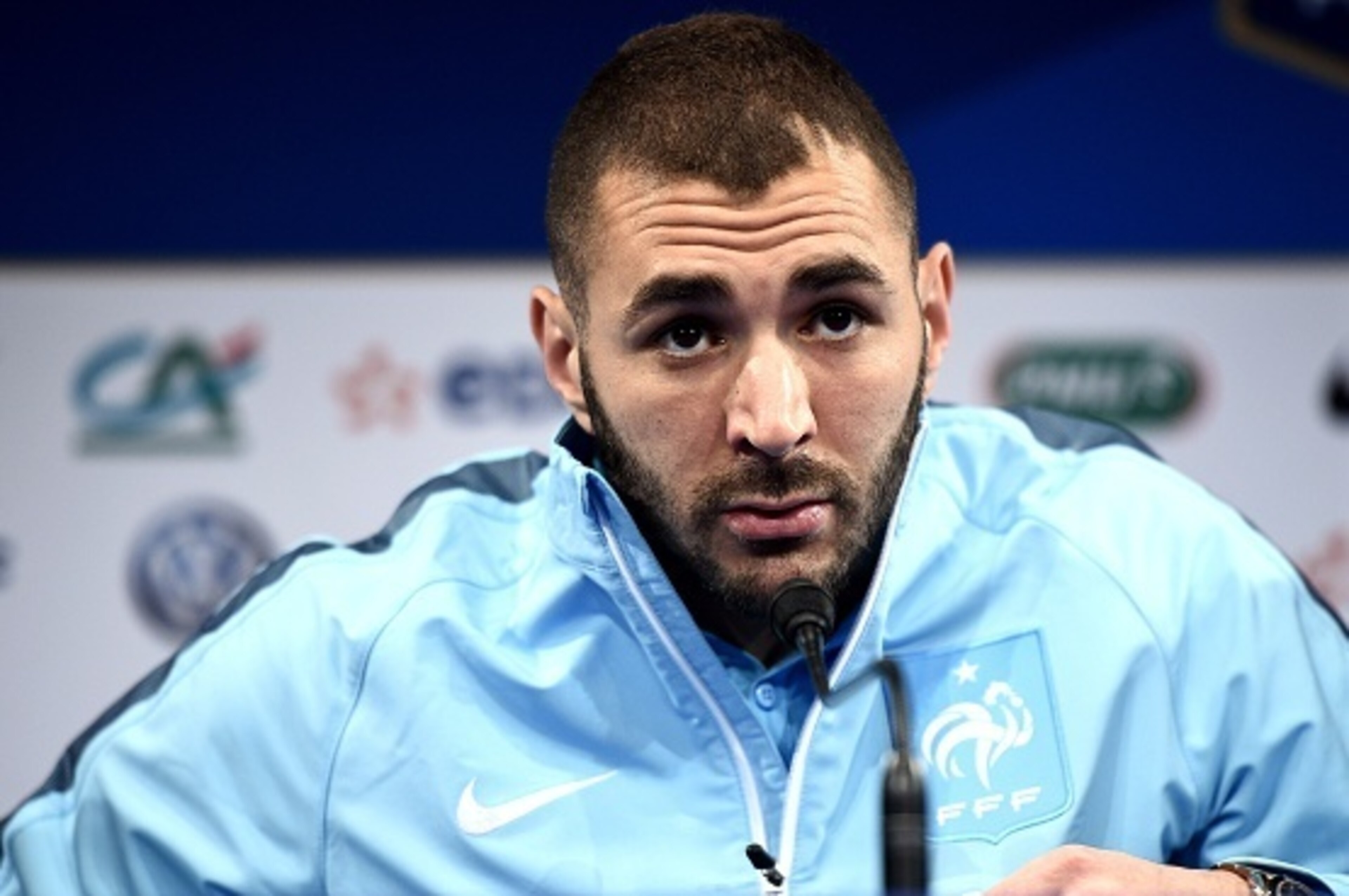 French forward Karim Benzema holds a press conference at the Stade de France stadium in Saint-Denis, north of Paris, on March 25, 2015 on the eve of a friendly football match between France and Brazil. AFP PHOTO / FRANCK FIFE        (Photo credit should r