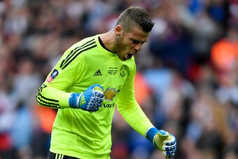 LONDON, ENGLAND - MAY 21:  David De Gea of Manchester United celebrates as Juan Mata of Manchester United scores their first goal during The Emirates FA Cup Final match between Manchester United and Crystal Palace at Wembley Stadium on May 21, 2016 in Lon