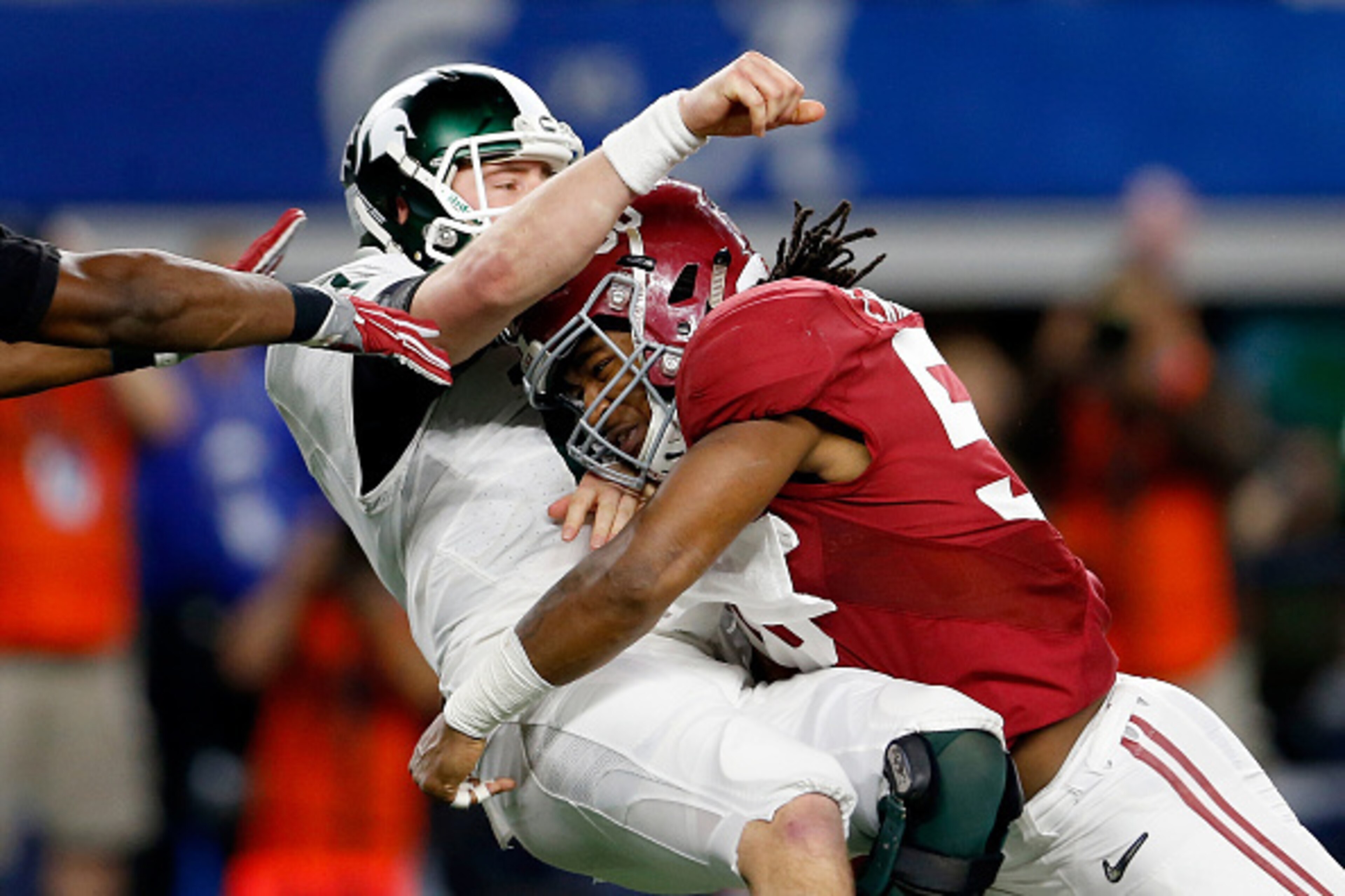 ARLINGTON, TX - DECEMBER 31:  Tim Williams #56 of the Alabama Crimson Tide sacks Connor Cook #18 of the Michigan State Spartans in the second half during the Goodyear Cotton Bowl at AT&T Stadium on December 31, 2015 in Arlington, Texas.  (Photo by Ron Jen
