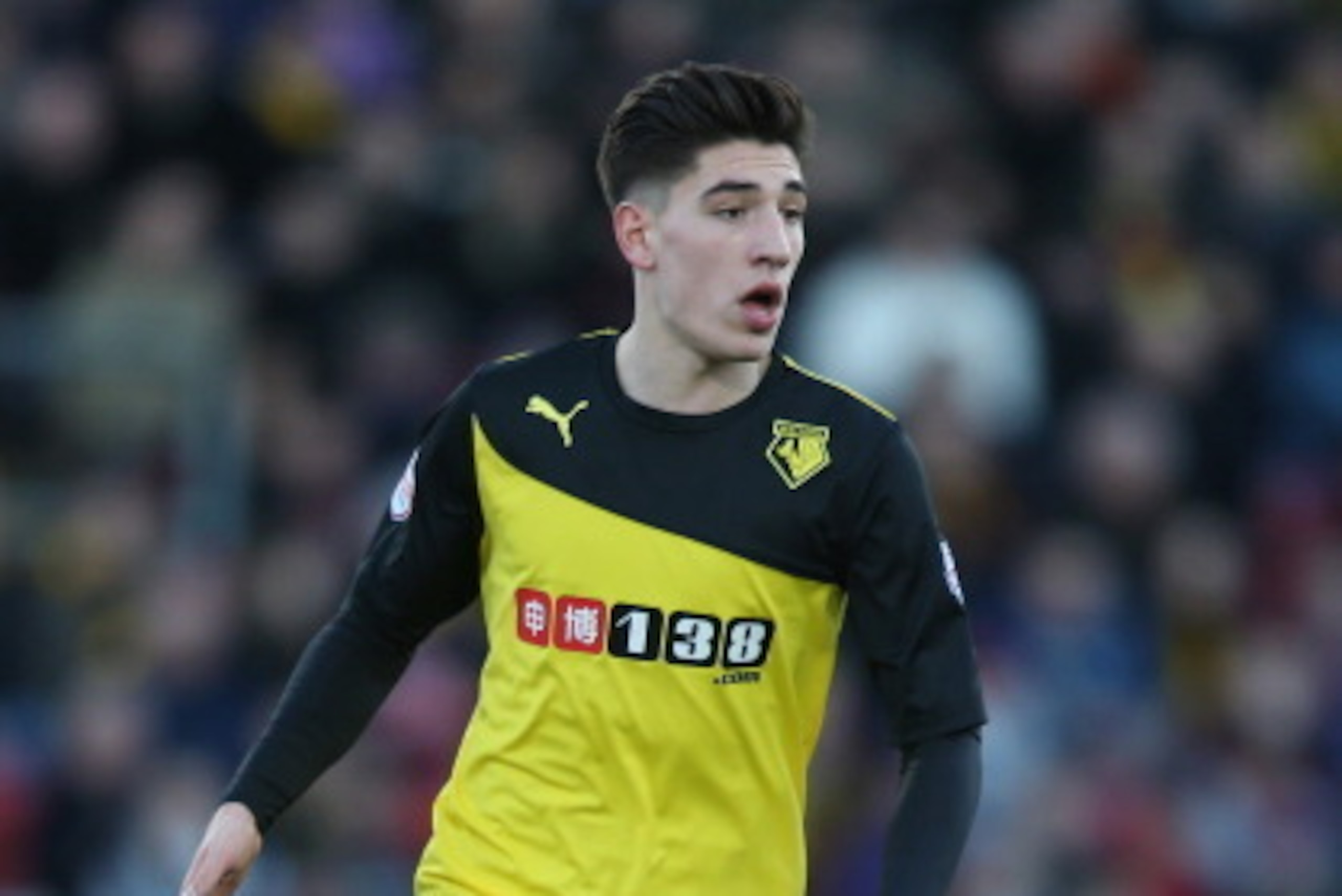 WATFORD, ENGLAND - JANUARY 11:  Hector Bellerin of Watford in action during the Sky Bet Championship match between Watford and Reading at Vicarage Road on January 11, 2014 in Watford, England,  (Photo by Mark Thompson/Getty Images)