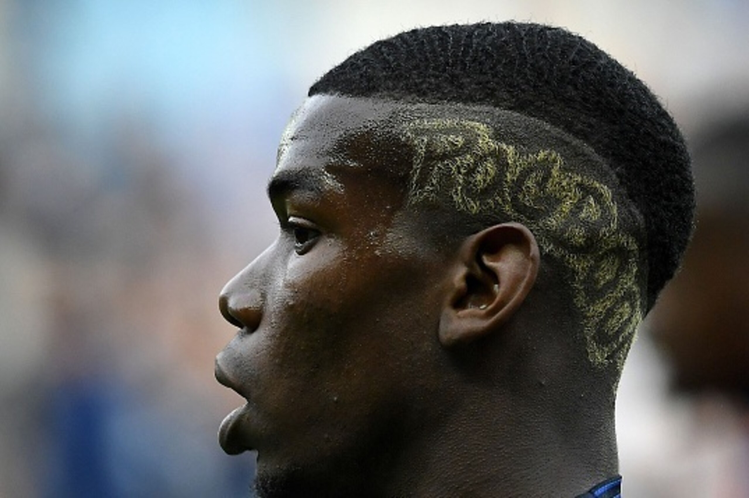 France's midfielder Paul Pogba reacts during the friendly football match between France and Cameroon, at the Beaujoire Stadium in Nantes, western France, on May 30, 2016. 
France won 3-2.   / AFP / FRANCK FIFE        (Photo credit should read FRANCK FIFE/