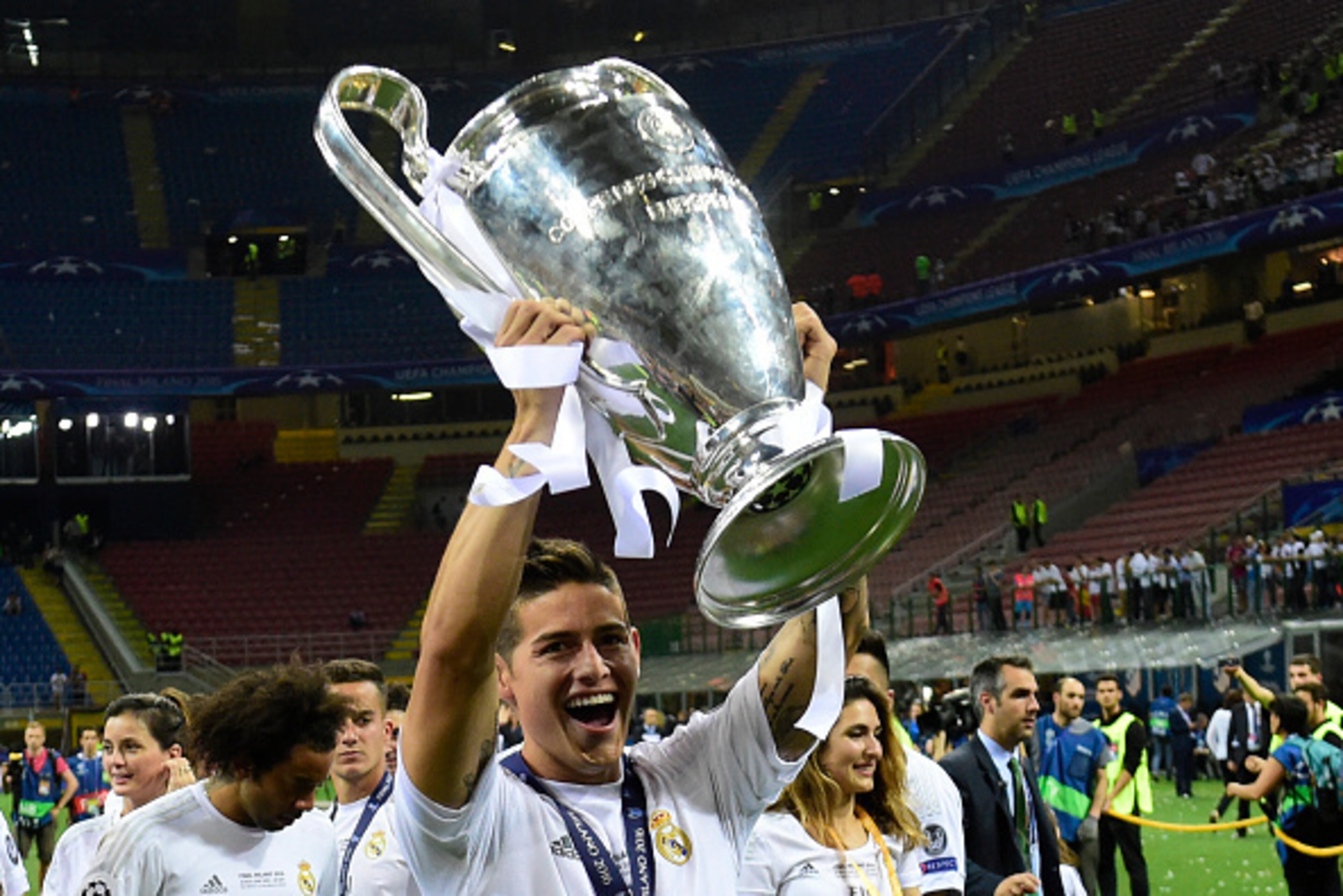 Real Madrid's Colombian midfielder James Rodriguez lifts the trophy after Real Madrid won the UEFA Champions League final football match between Real Madrid and Atletico Madrid at San Siro Stadium in Milan, on May 28, 2016.
Real Madrid beat city rivals At Real Madrid's Colombian midfielder James Rodriguez lifts the trophy after Real Madrid won the UEFA Champions League final football match between Real Madrid and Atletico Madrid at San Siro Stadium in Milan, on May 28, 2016.
Real Madrid beat city rivals At