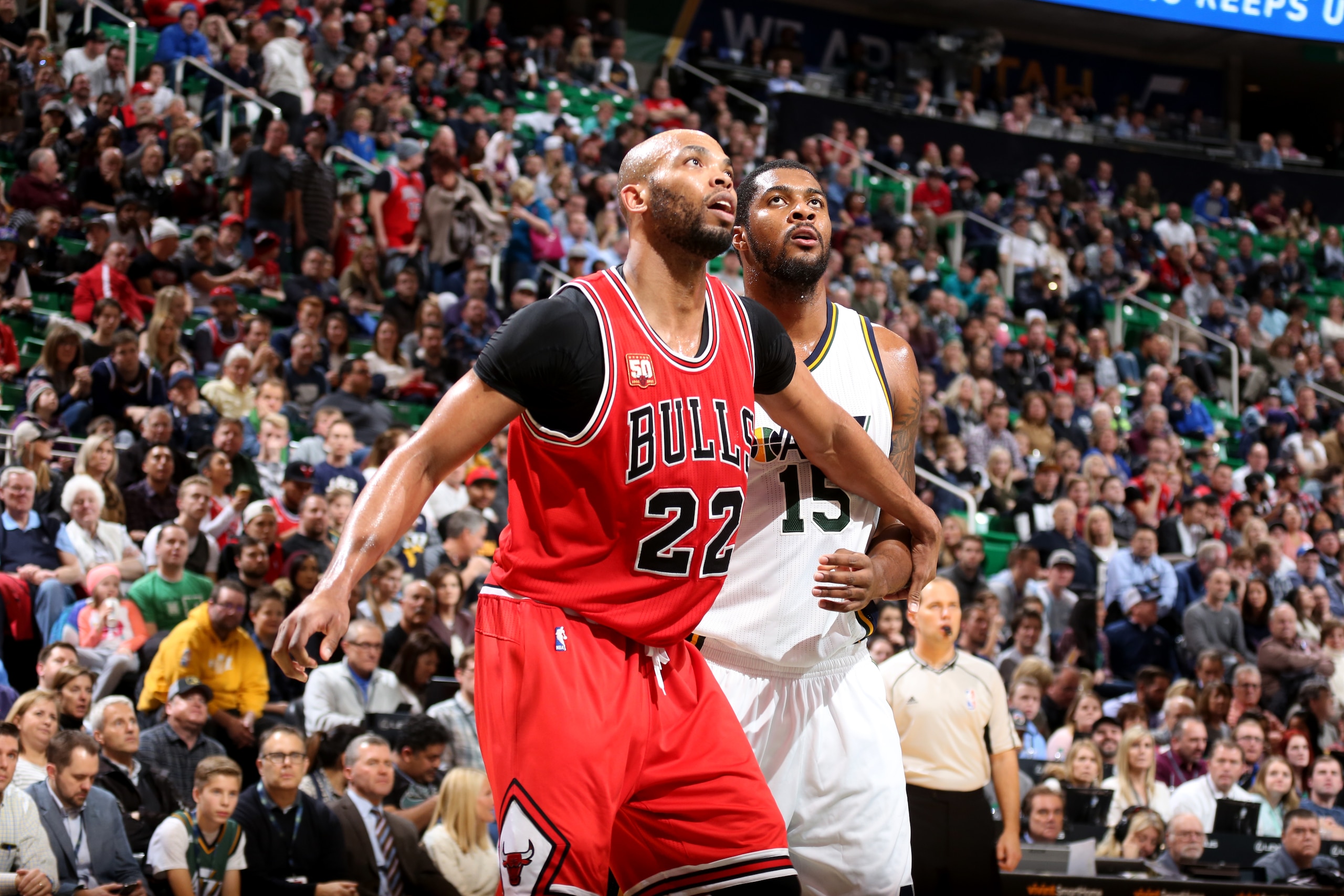 SALT LAKE CITY, UT - FEBRUARY 1: Taj Gibson #22 of the Chicago Bulls boxes out against Derrick Favors #15 of the Utah Jazz during the game on February 1, 2016 at EnergySolutions Arena in Salt Lake City, Utah. NOTE TO USER: User expressly acknowledges and