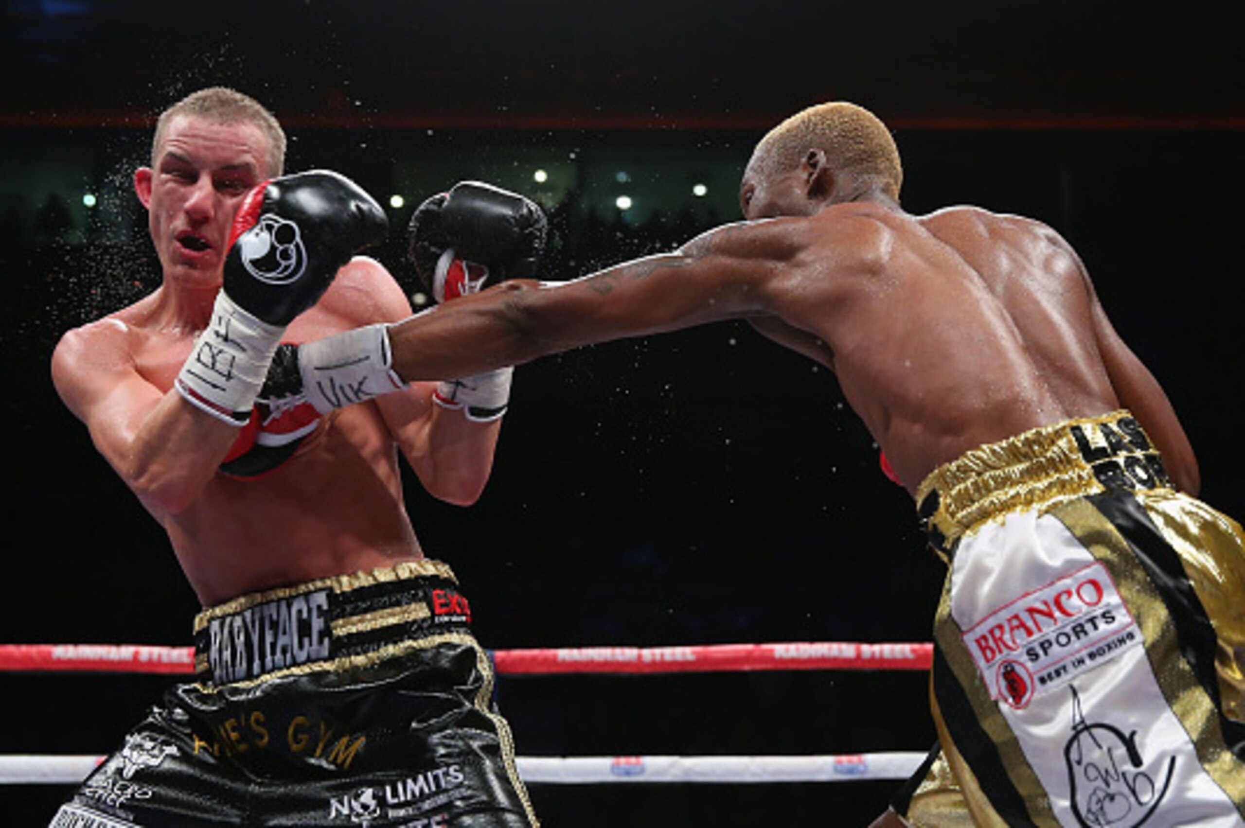 LIVERPOOL, ENGLAND - MARCH 06:  Zolani Tete of South Africa lands a left punch on Paul Butller of England during the IBF Super-Flyweight Championship of the World fight between Paul Butller and Zolani Tete at the Echo Arena on March 6, 2015 in Liverpool, 