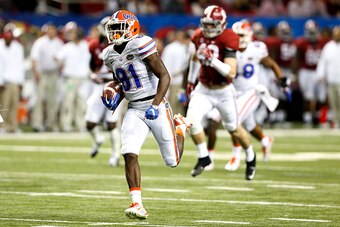 ATLANTA, GA - DECEMBER 5: Antonio Callaway #81 of the Florida Gators returns a punt for a second quarter touchdown against the Alabama Crimson Tide during the SEC Championship at the Georgia Dome on December 5, 2015 in Atlanta, Georgia. (Photo by Mike Zar