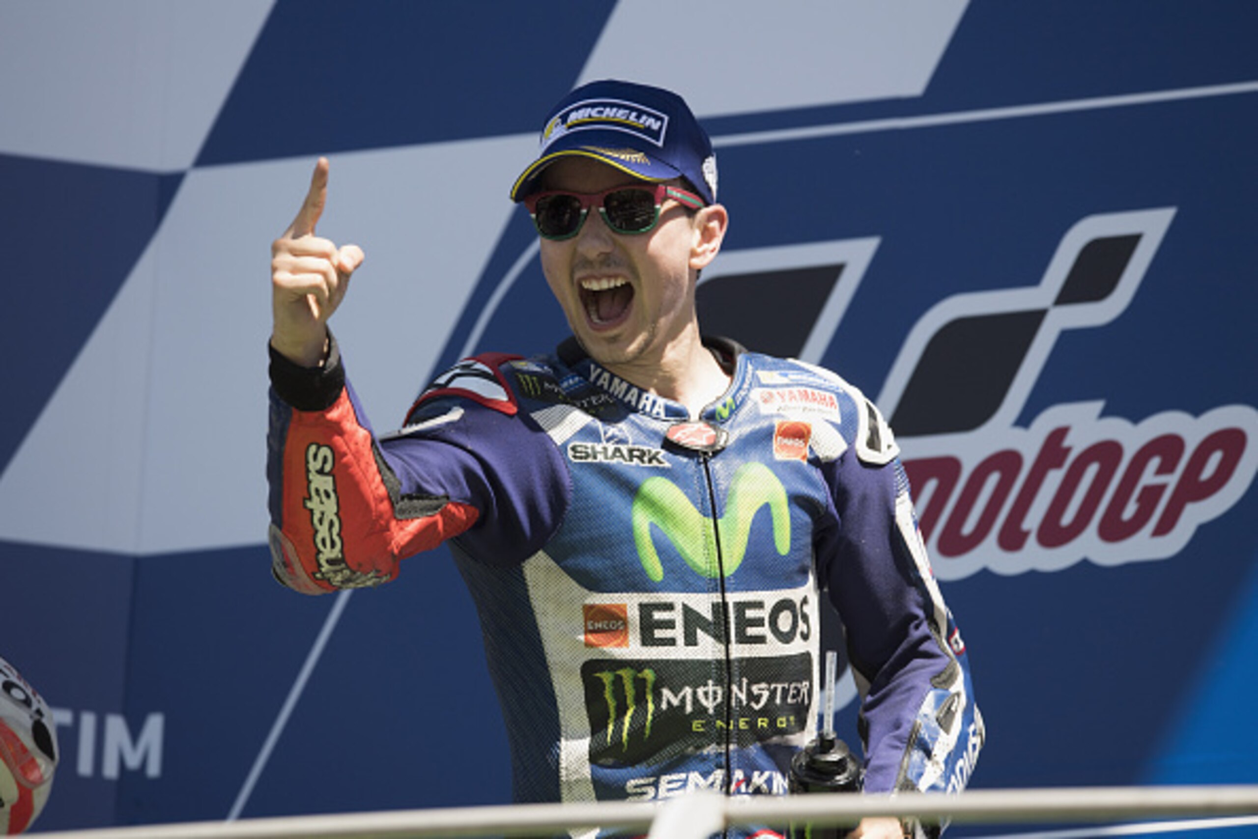SCARPERIA, ITALY - MAY 22:  Jorge Lorenzo of Spain and Movistar Yamaha MotoGP celebrates on the podium the victory at the end of the MotoGP race during MotoGp of Italy - Race at Mugello Circuit on May 22, 2016 in Scarperia, Italy.  (Photo by Mirco Lazzari