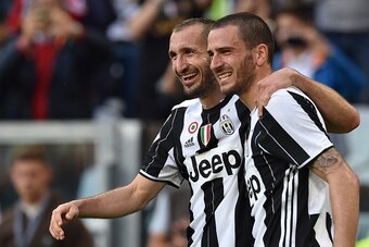 TURIN, ITALY - MAY 14:  Giorgio Chiellini (L) of Juventus FC celebrates after a goal with team mate Leonardo Bonucci during the Serie A match between Juventus FC and UC Sampdoria at Juventus Arena on May 14, 2016 in Turin, Italy.  (Photo by Valerio Pennic