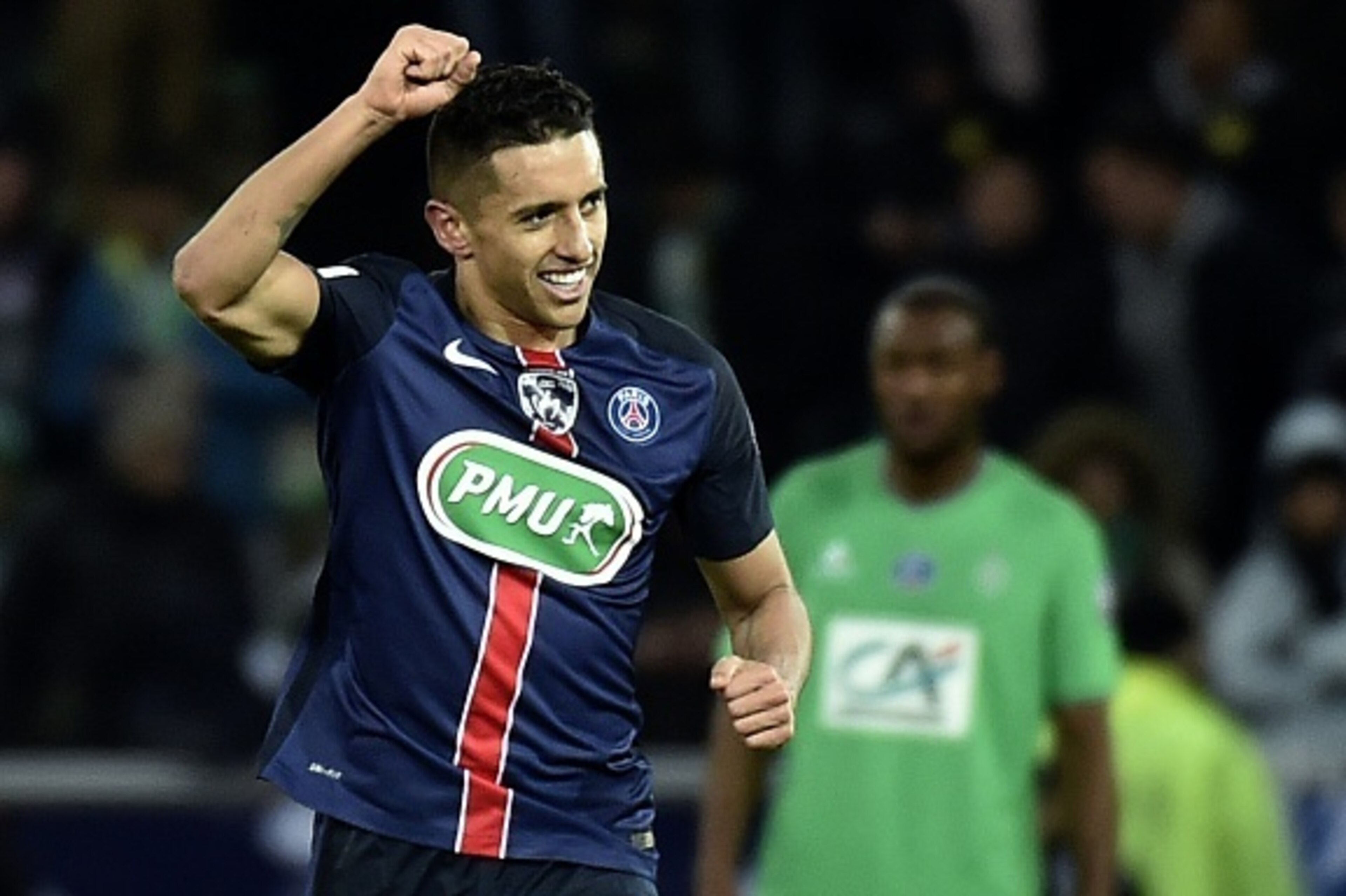 ALTERNATIVE CROP
Paris Saint-Germain's Brazilian defender Marquinhos (R) celebrates after scoring a goal during the French Cup football match between AS Saint-Etienne (ASSE) and Paris Saint-Germain (PSG) on March 2, 2016, at the Geoffroy Guichard Stadium 